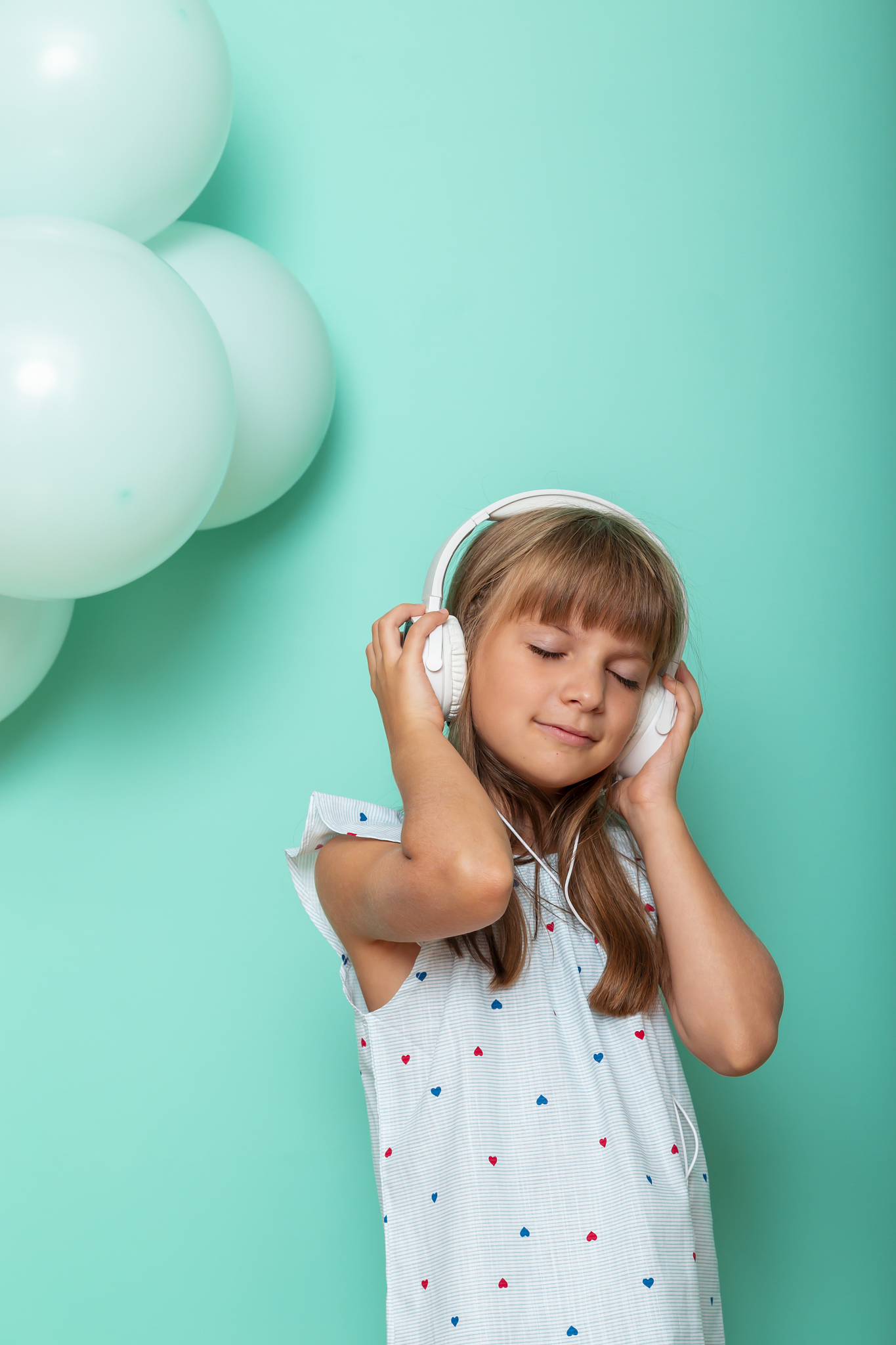little girl listening to the music