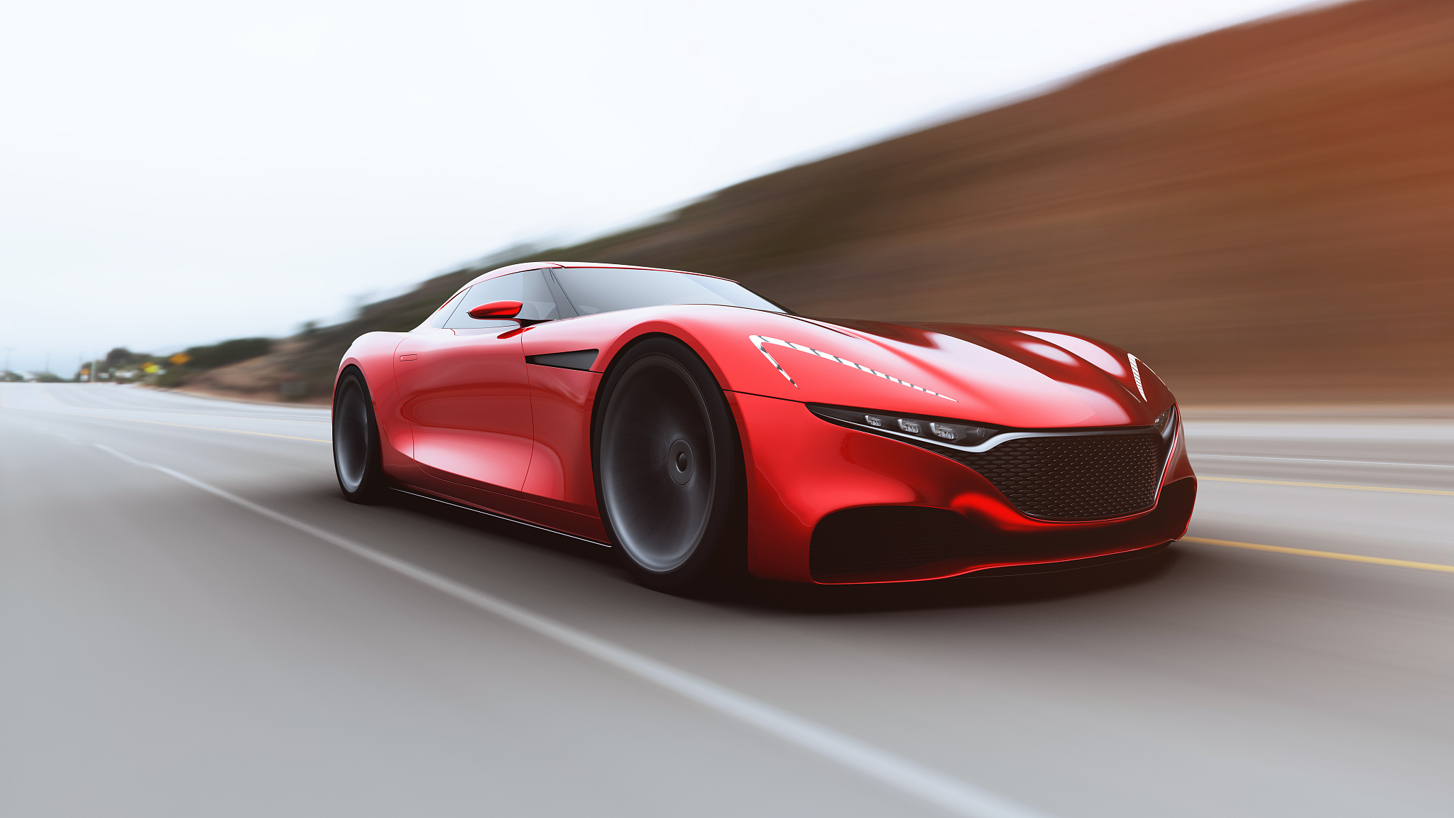 red car driving on a road