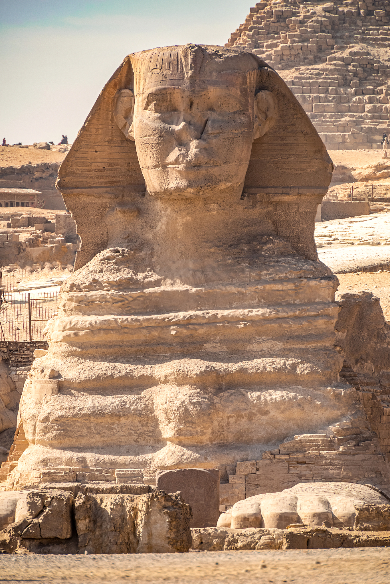 sphinx monument against the background of large pyramids on a su