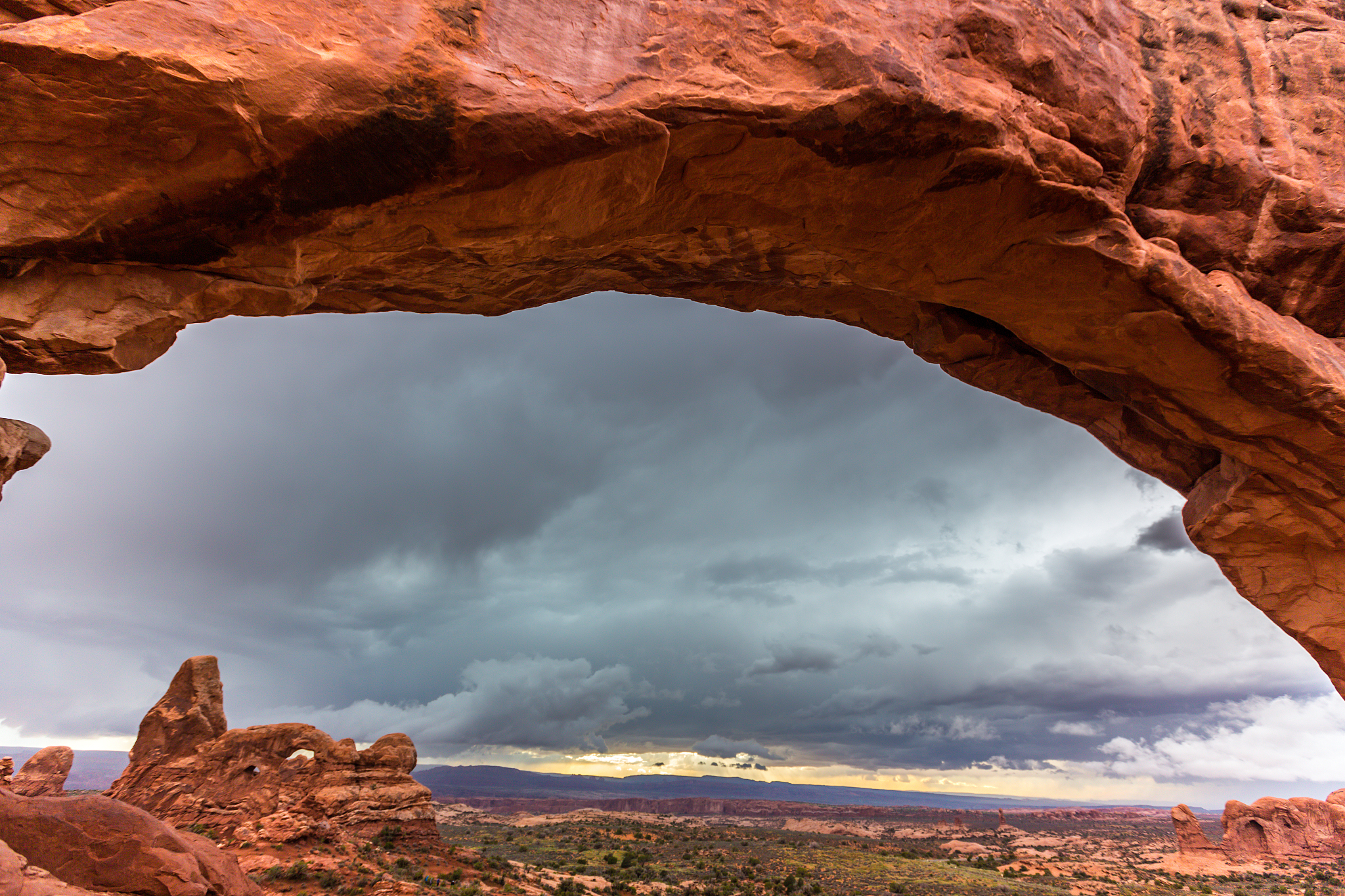 dramatic storm clouds and rain in the utah desert, arches nation
