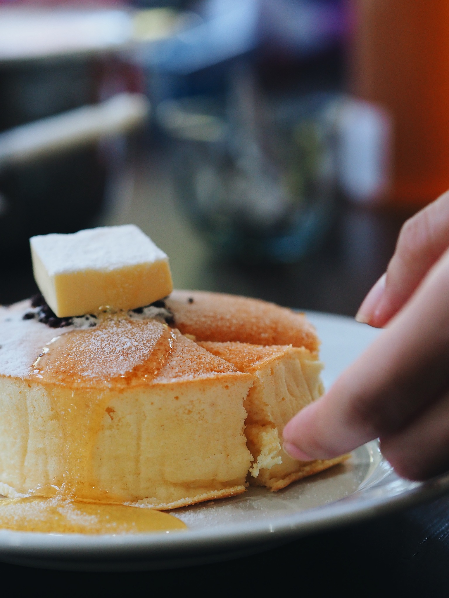 cropped hand dessert in plate