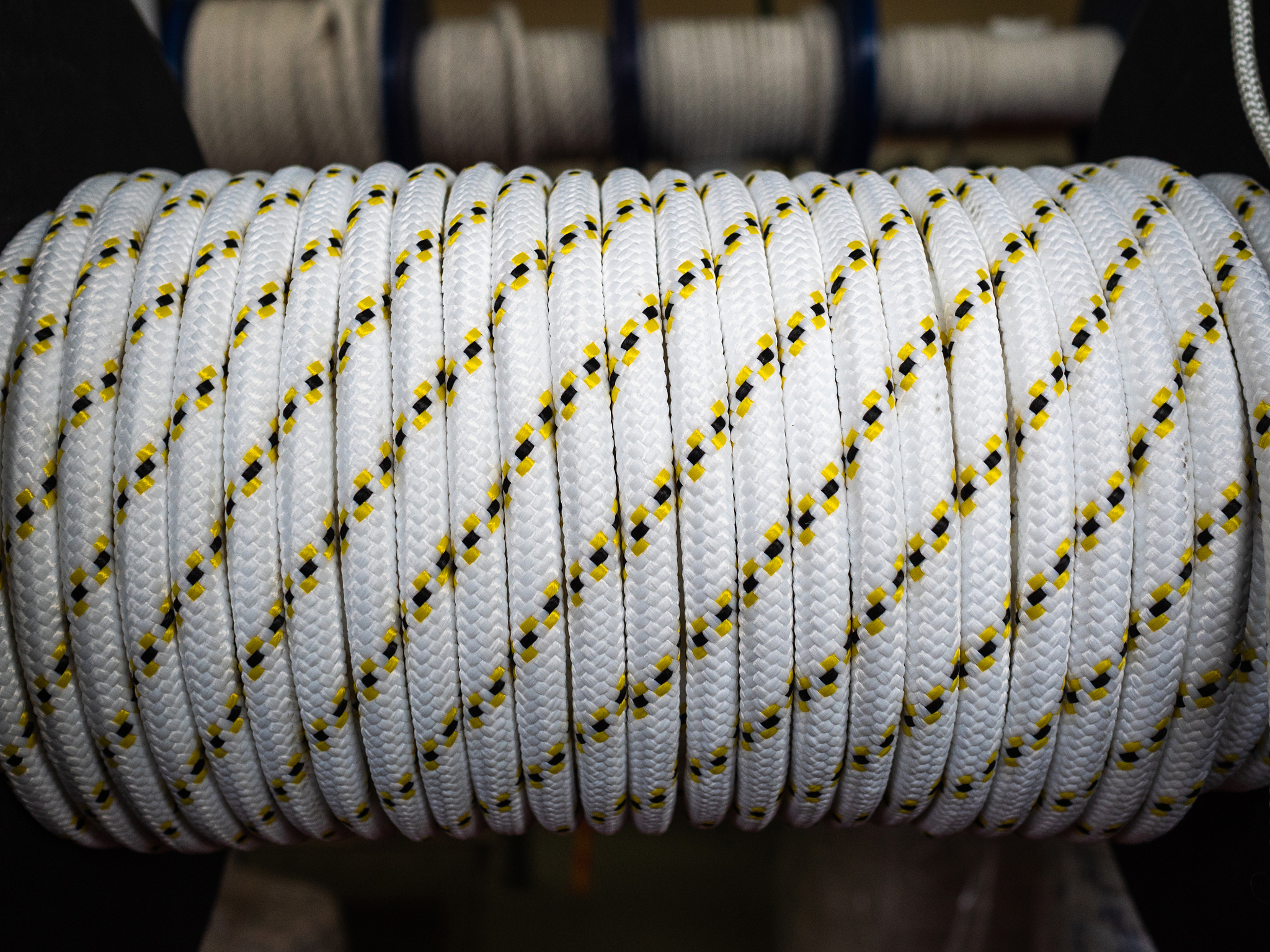 white rope on a show-window of shop. a safety rope for climbers.