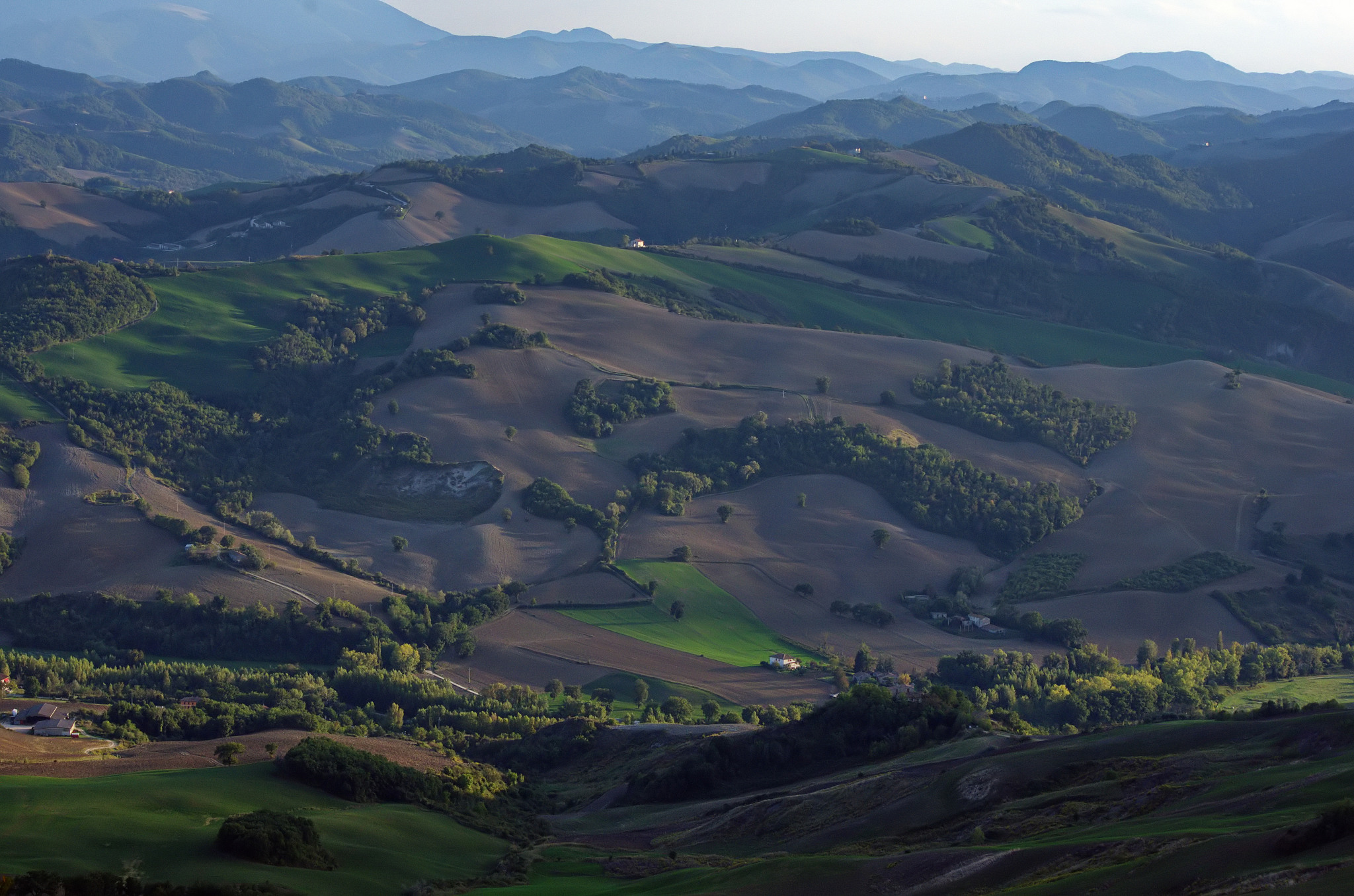 scenic view of landscape and mountains against sky