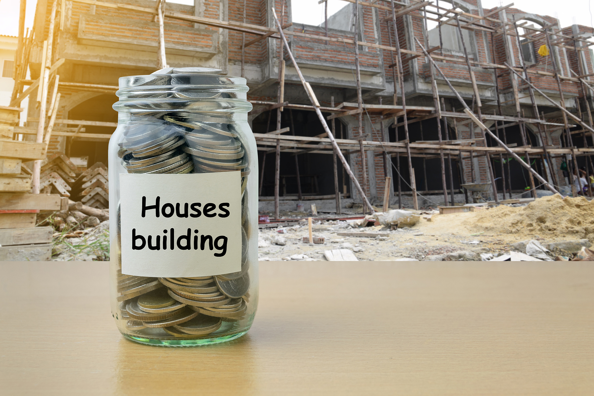 money saving for houses building in the glass bottle