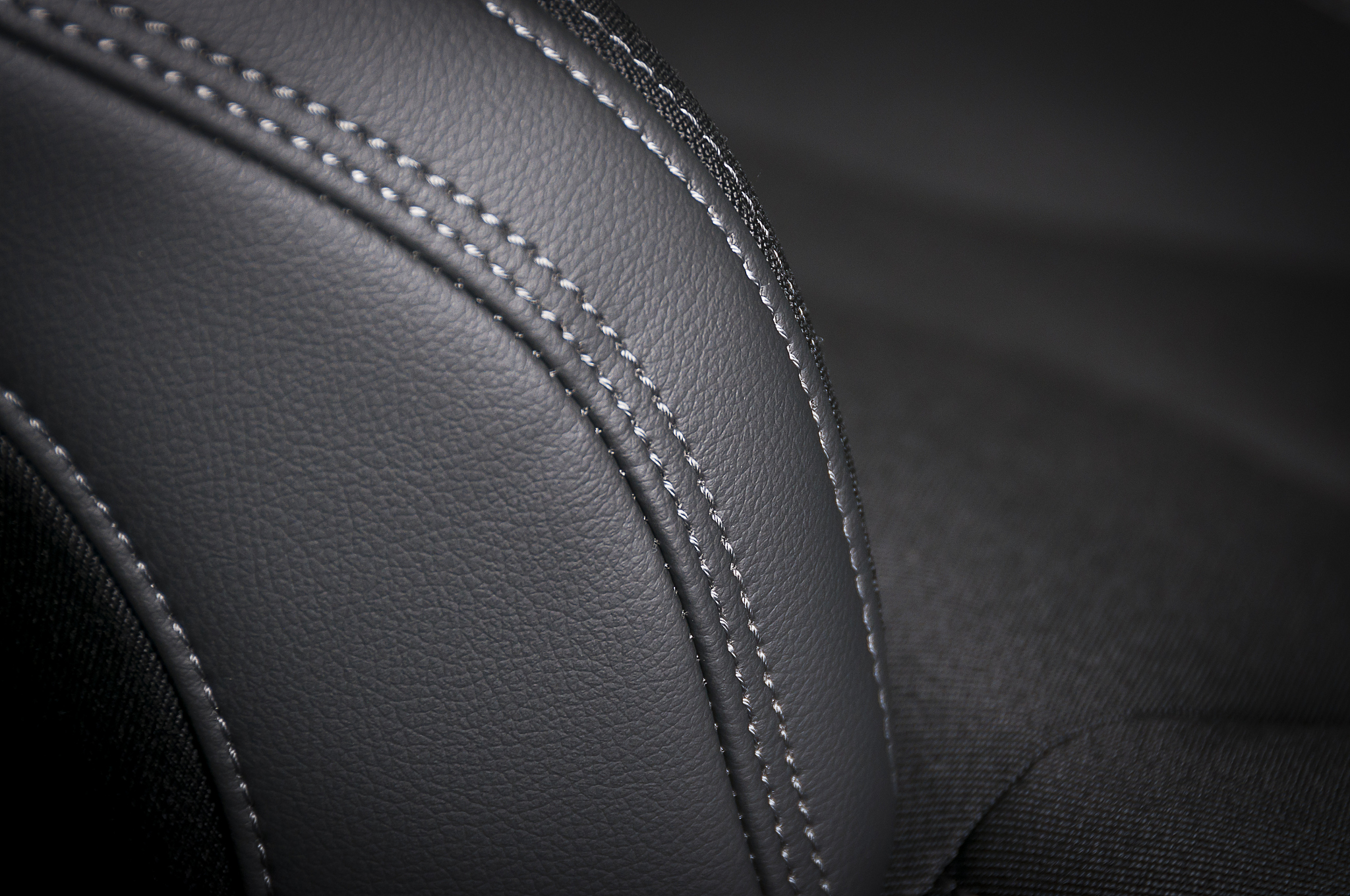 leather car seats  detail with focus on stitch