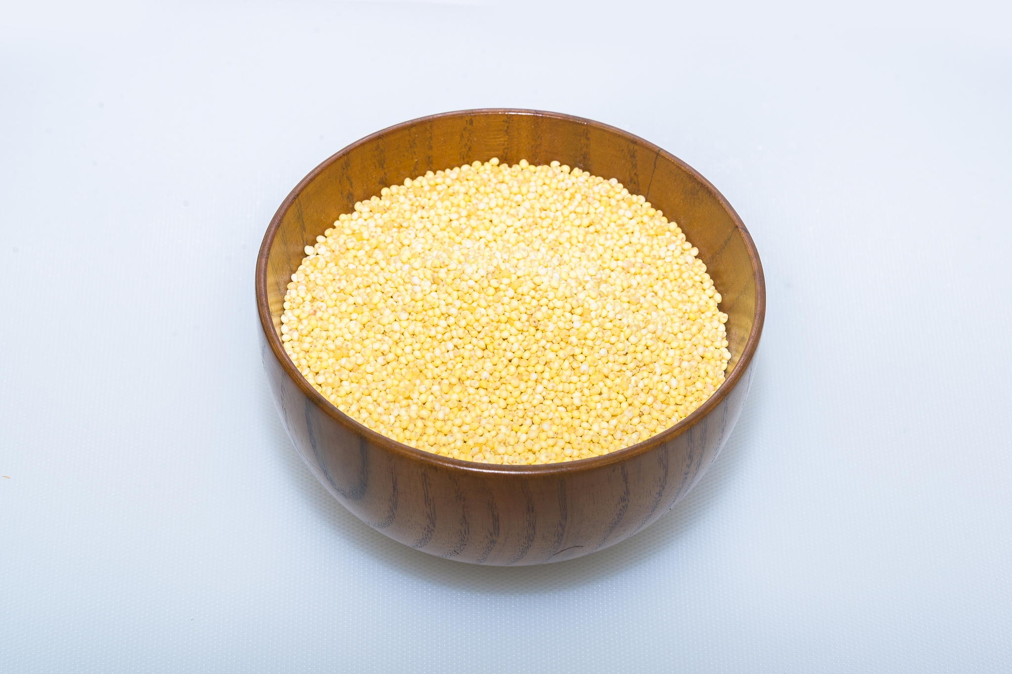 millet in a wooden bowl