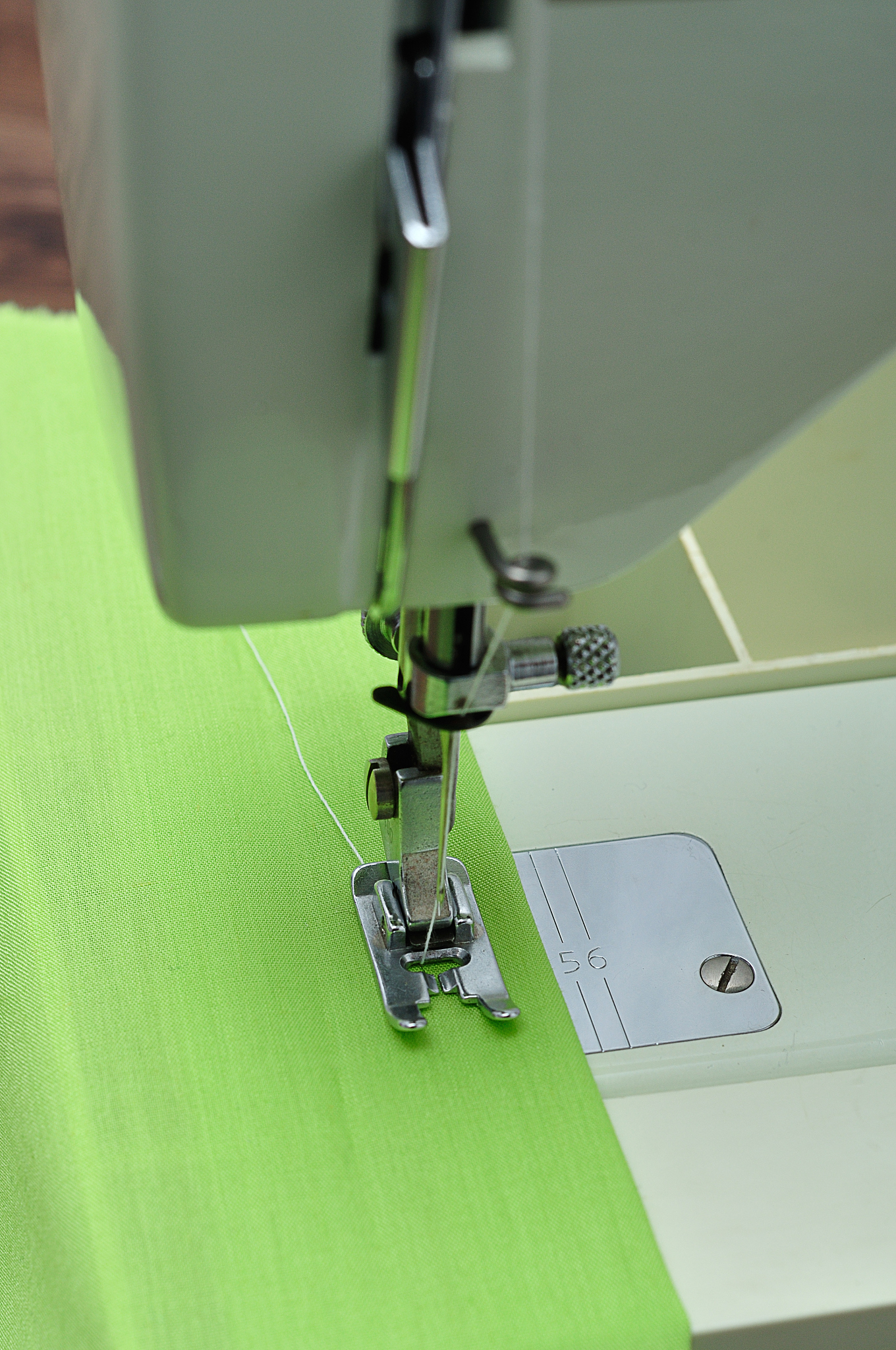 拷边机针距调大还是密帮我用210字详细描述