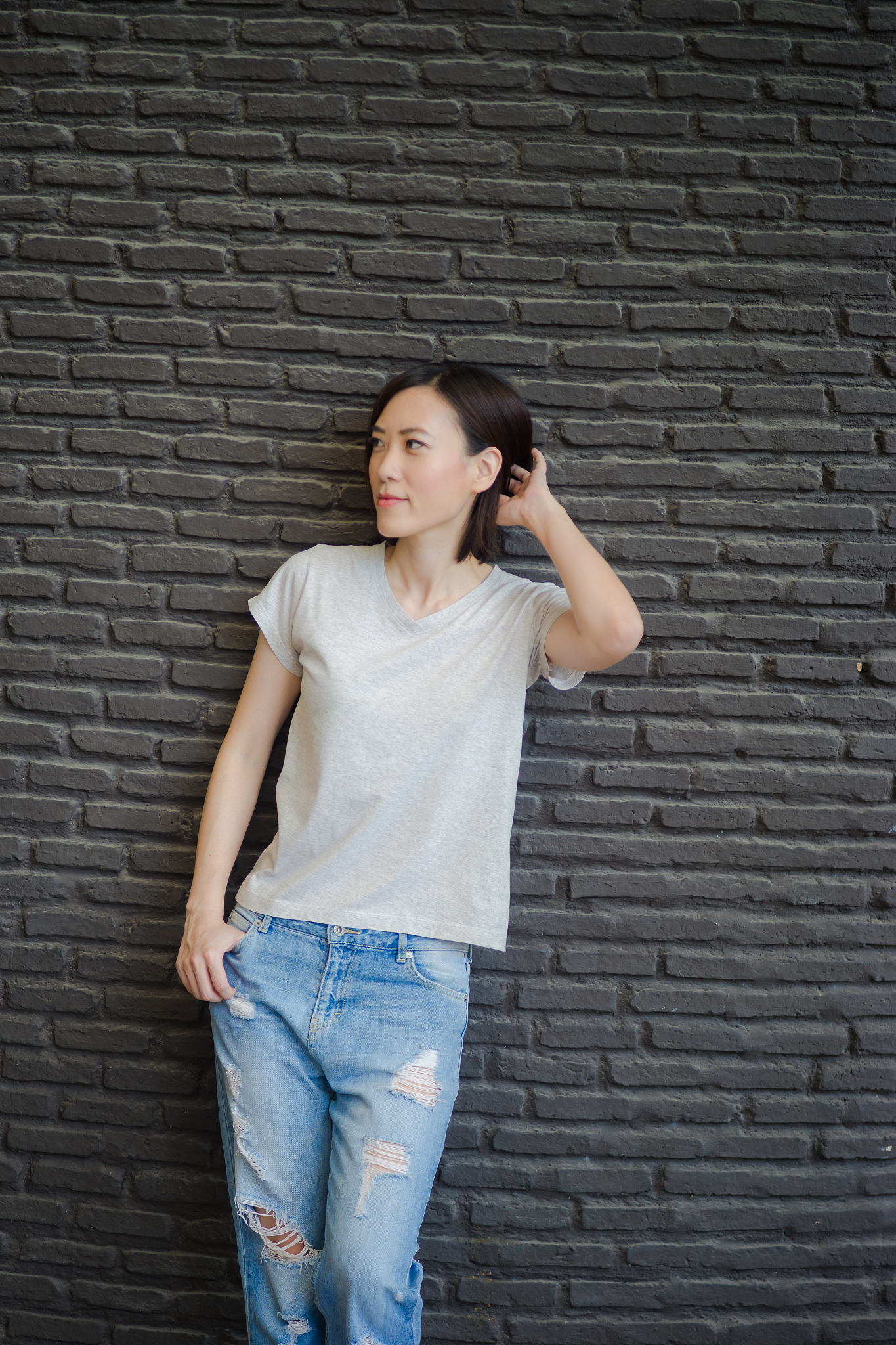 Stunning Portrait of a Chinese Girl: Long Hair, Black Top, and Blue Jeans