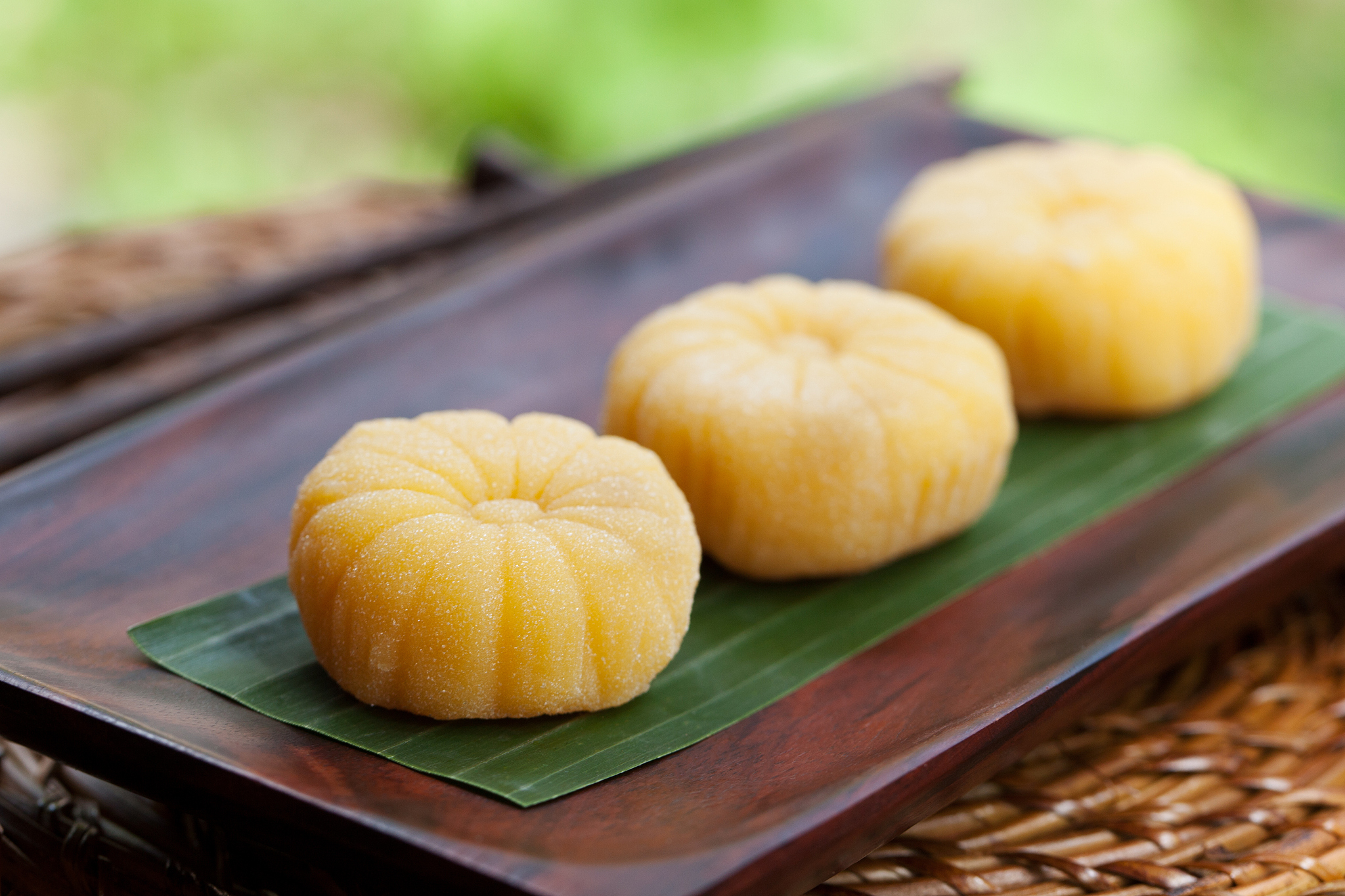 mochi japanese dessert with mango outdoor garden background