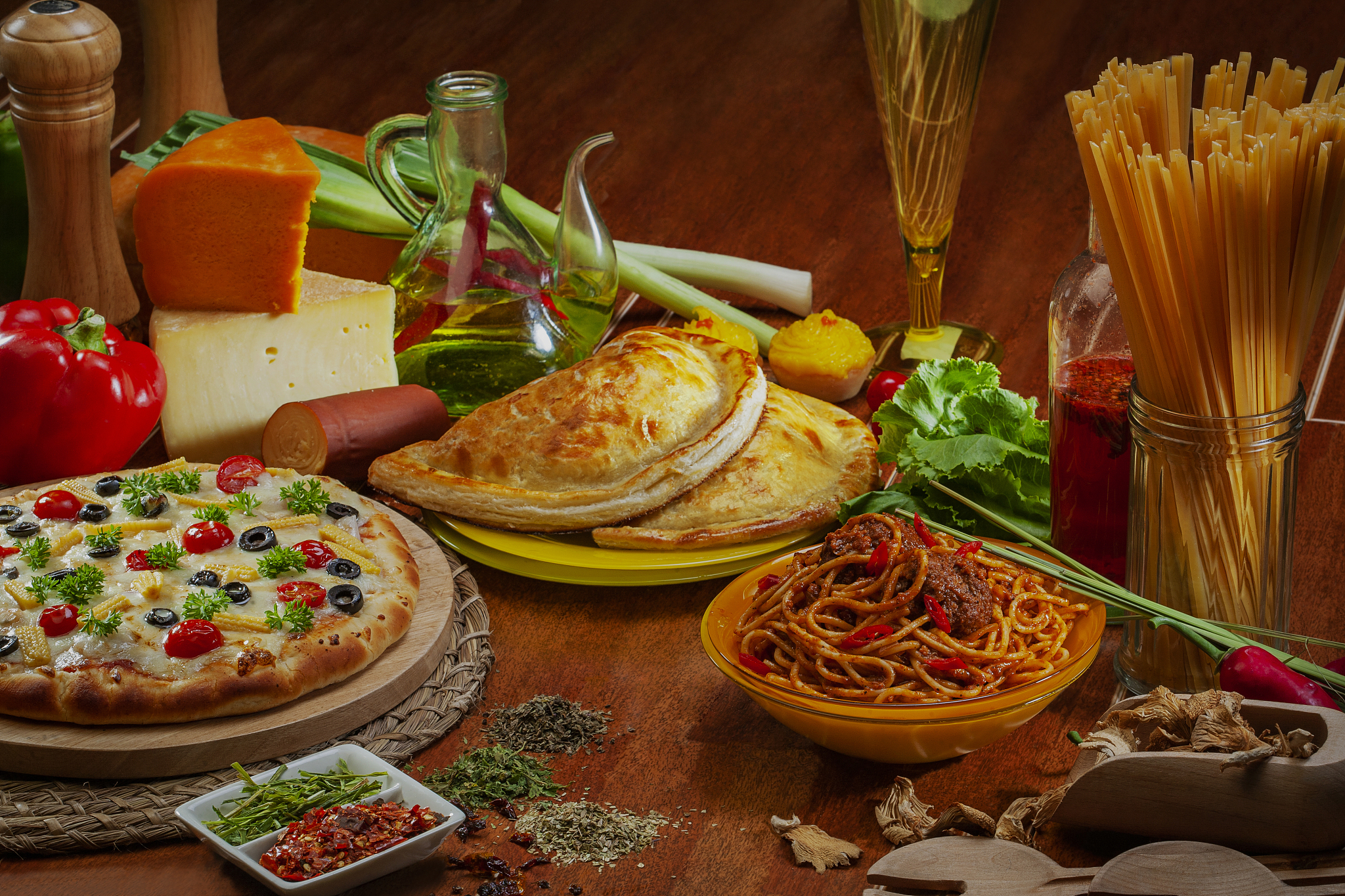 delicious italian food items spread on the table.