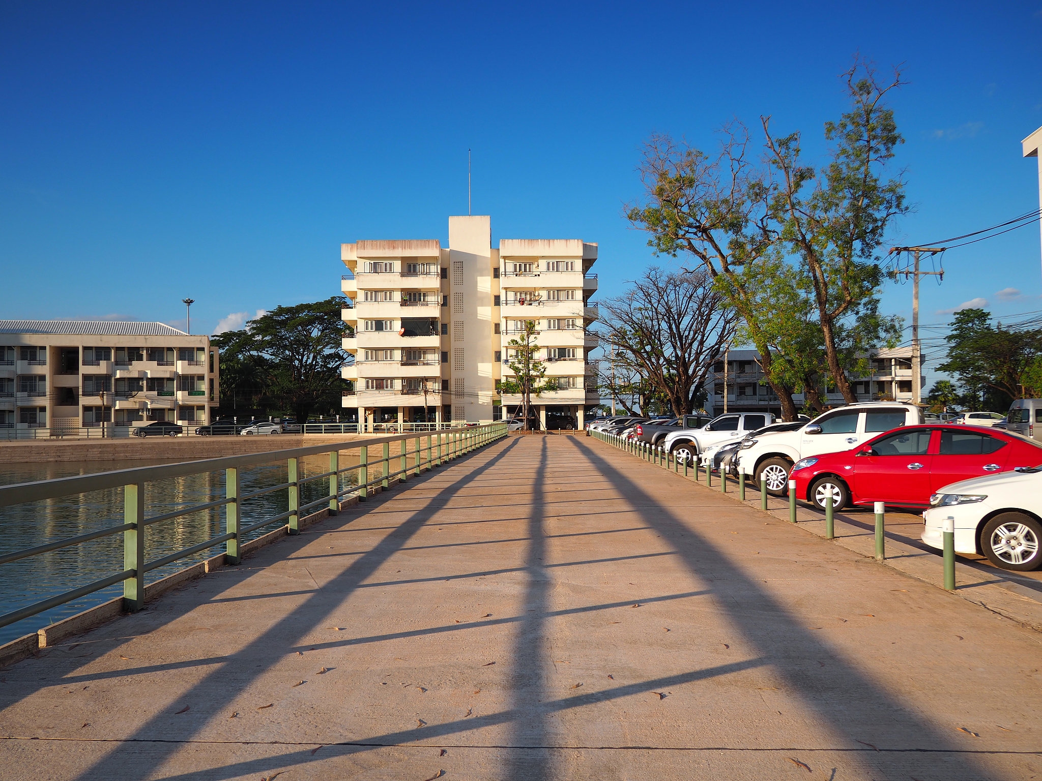 view of buildings in city against blue sky