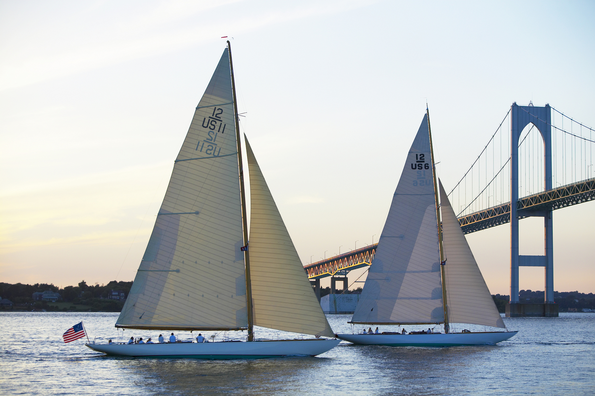 racing sailboats and bridge