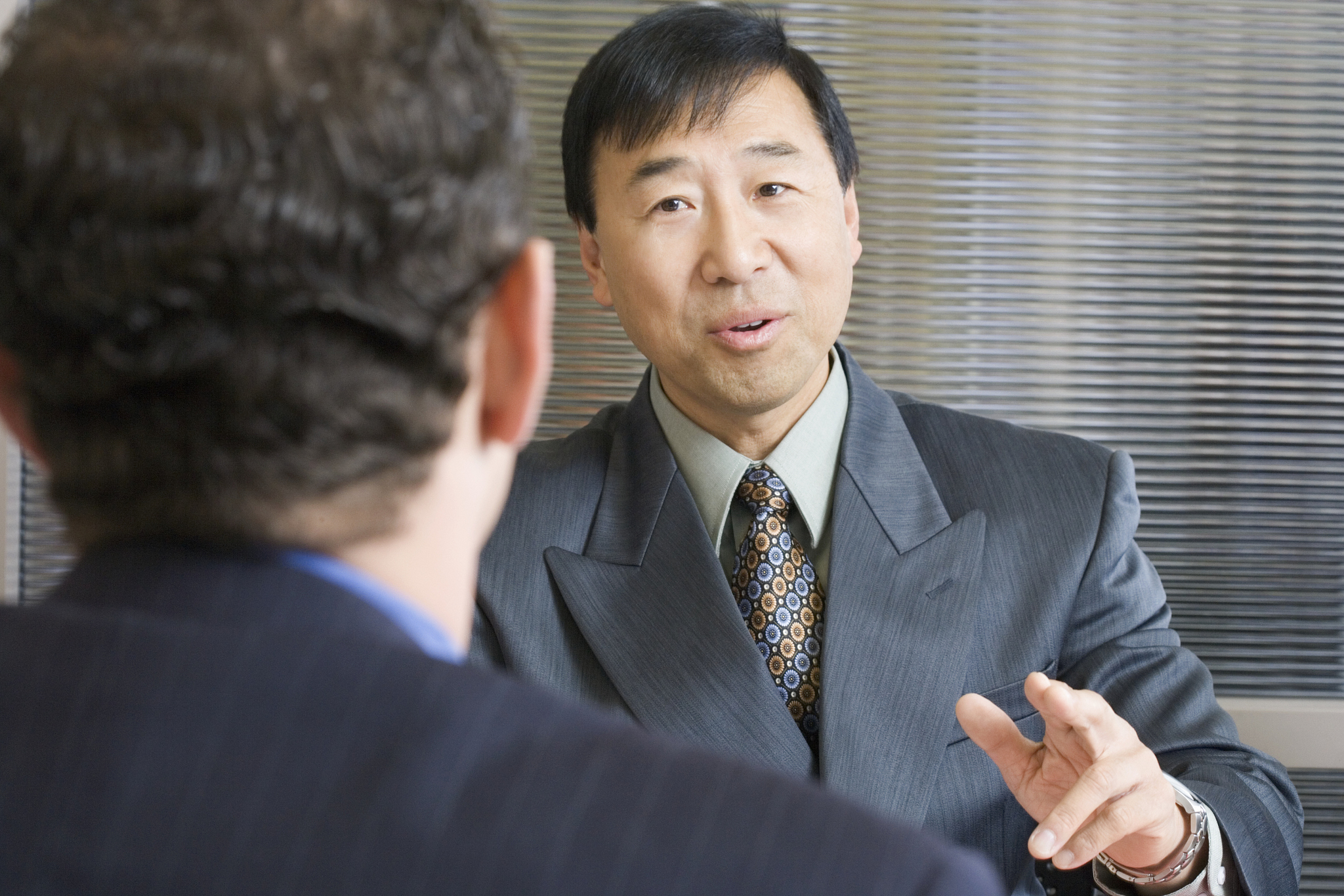 two businessmen talking