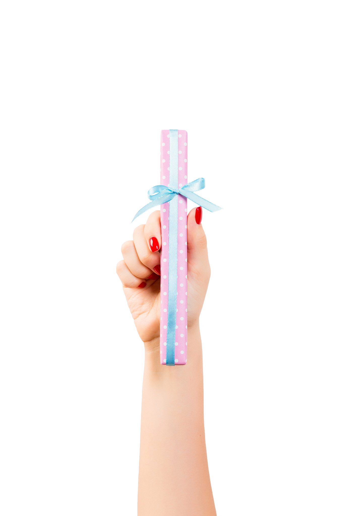 woman hands give wrapped christmas or other holiday handmade pre