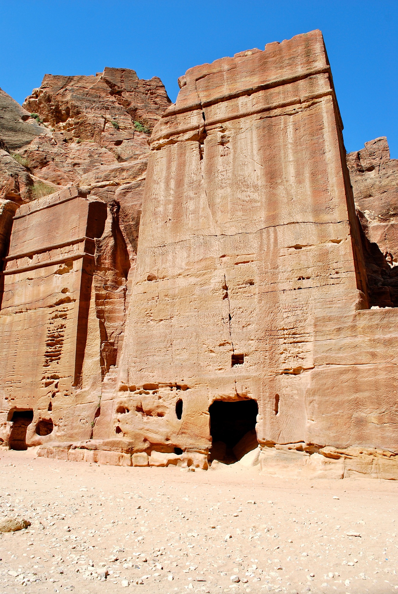 buildings carved into rock wall-petra 4