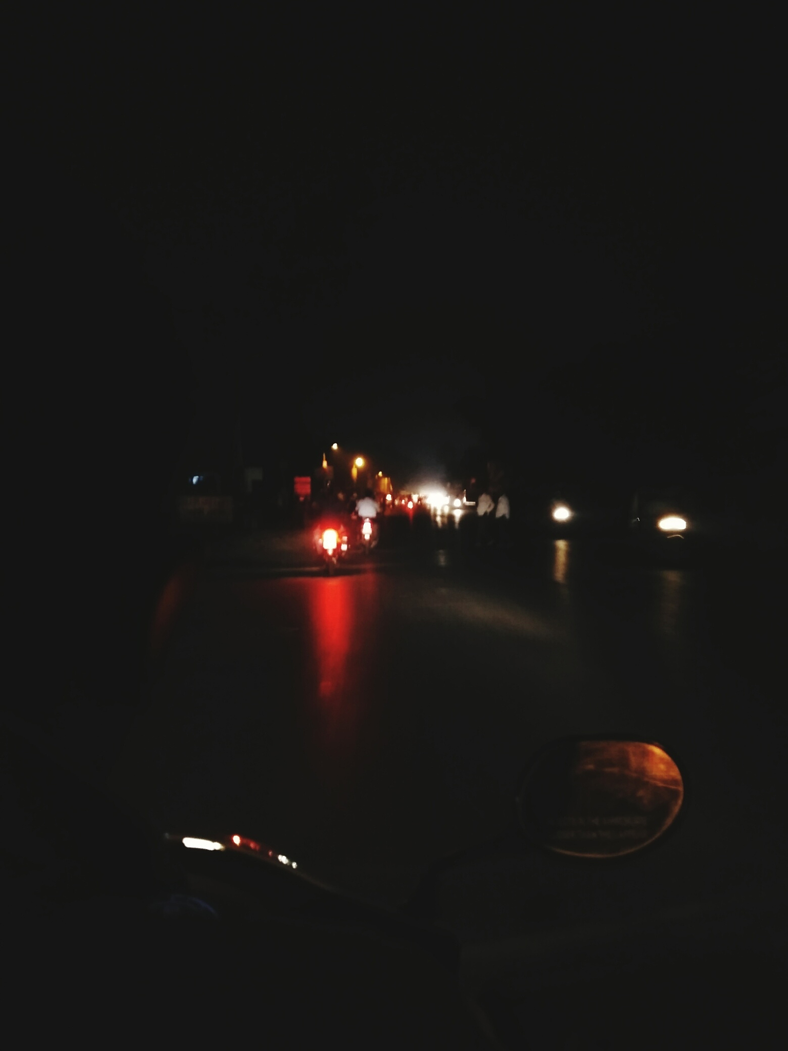 illuminated car on road at night