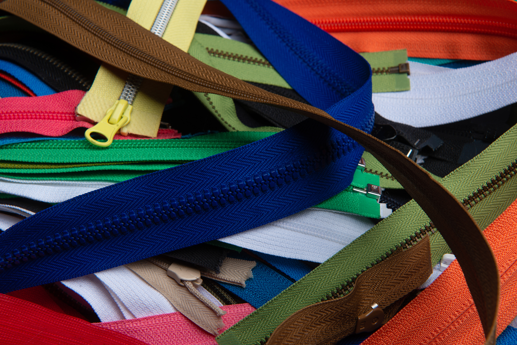 bunch of multicolored zippers