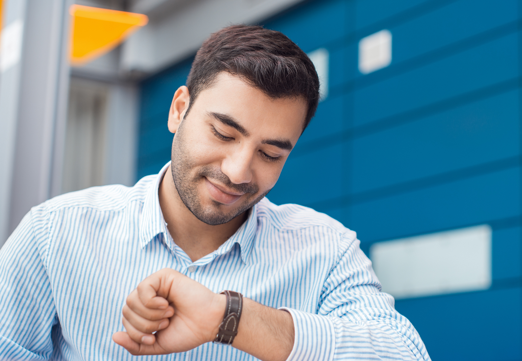 businessman looking at his watch