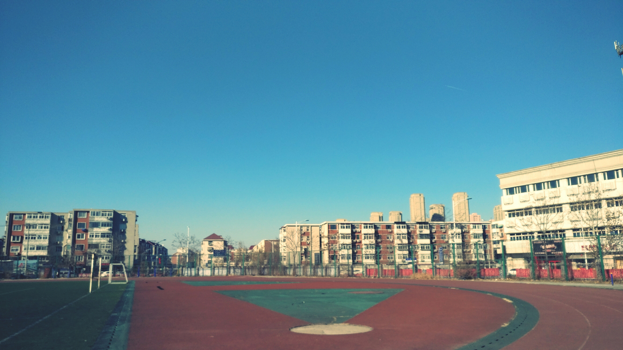 cityscape against clear blue sky