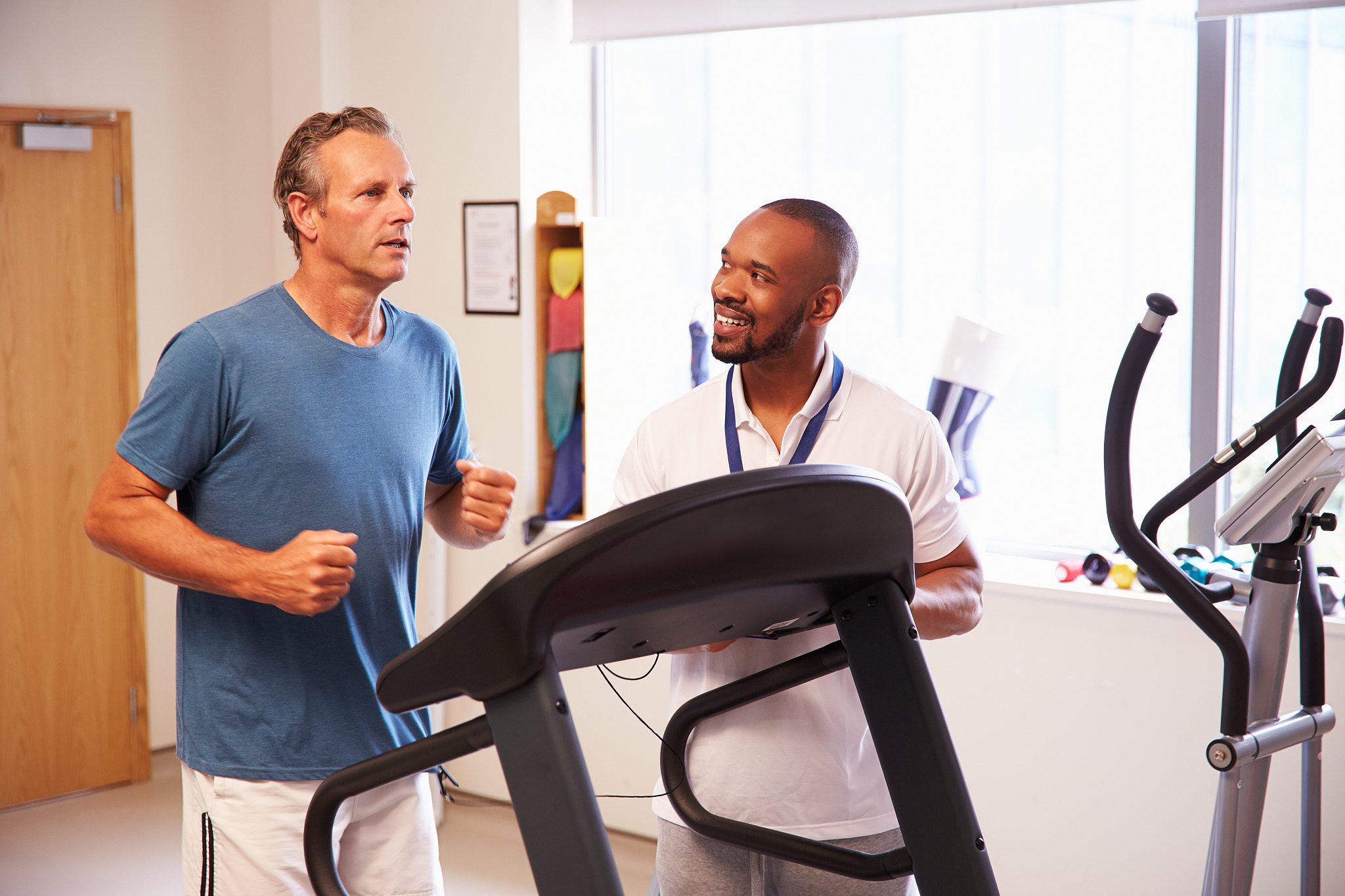 patient using treadmill in hospital physiotherapy department
