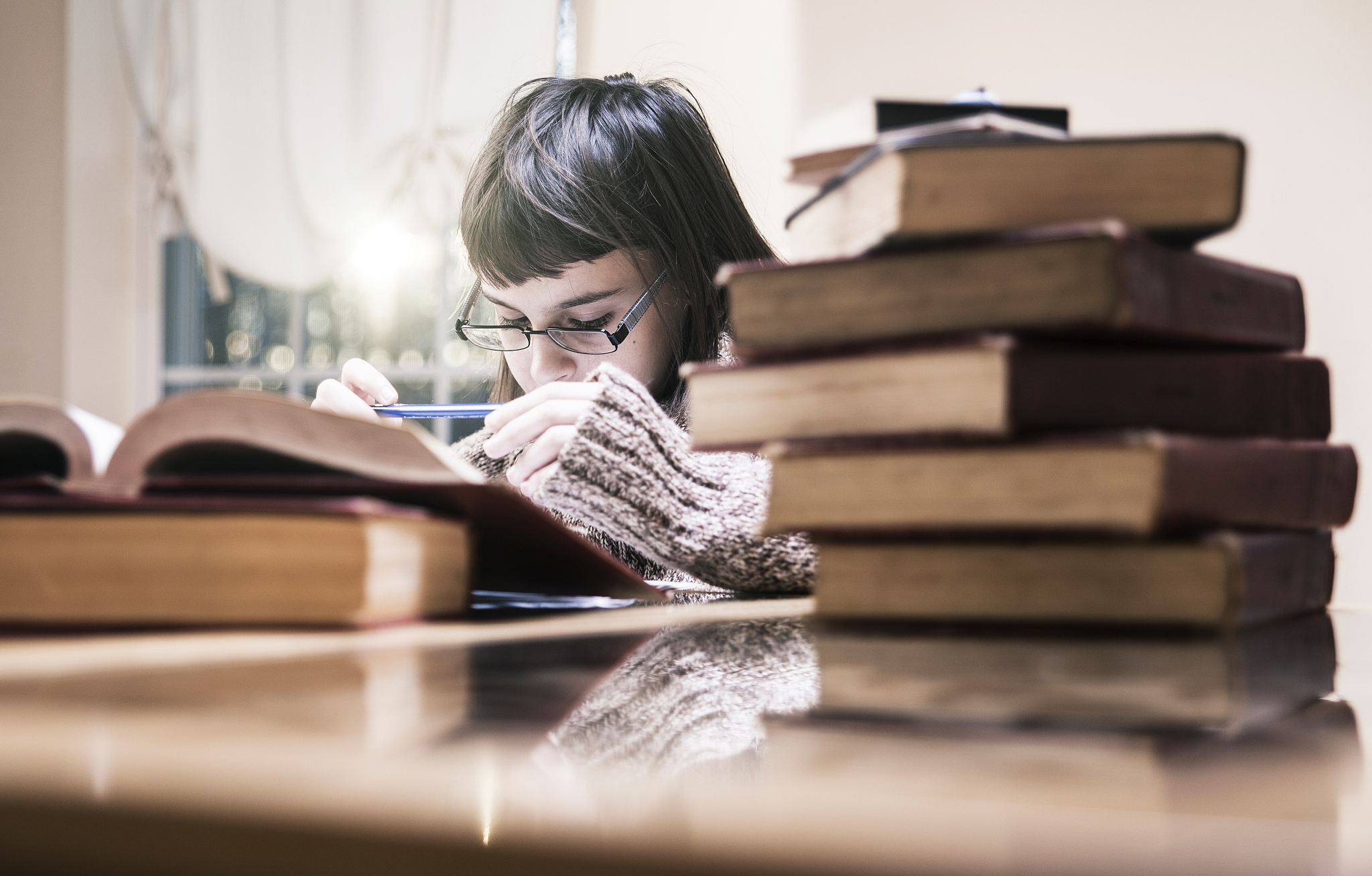 teenager girl make a homework