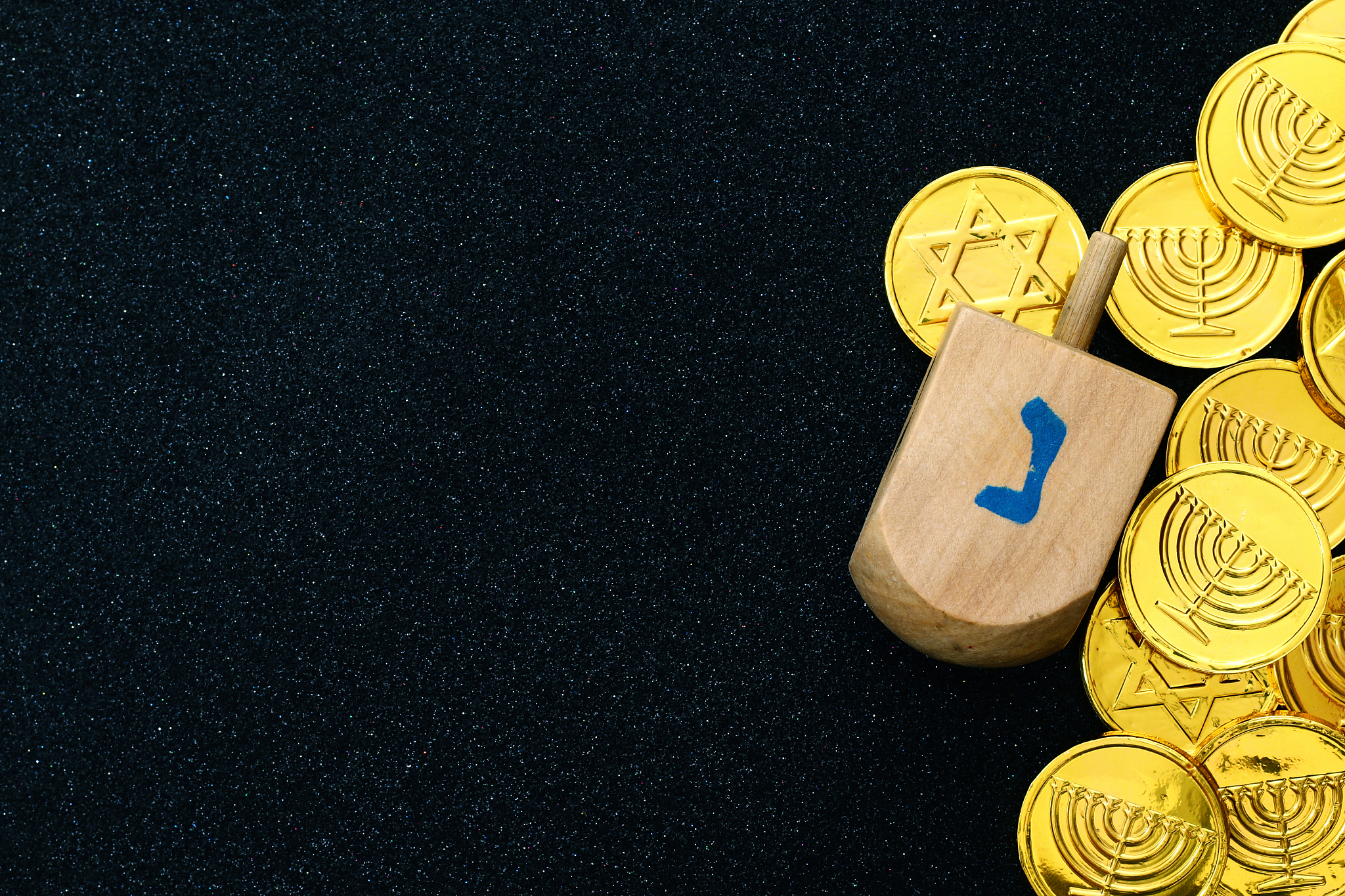 image of jewish holiday hanukkah with wooden dreidel