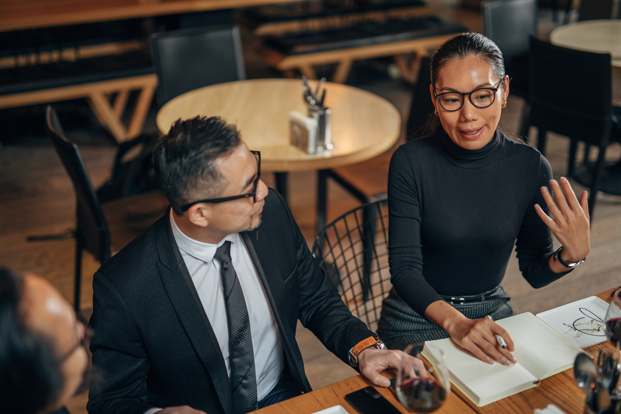 business people on meeting in restaurant