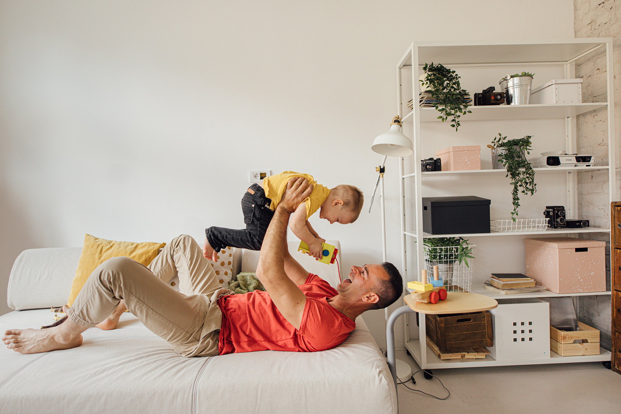father and son having fun at home