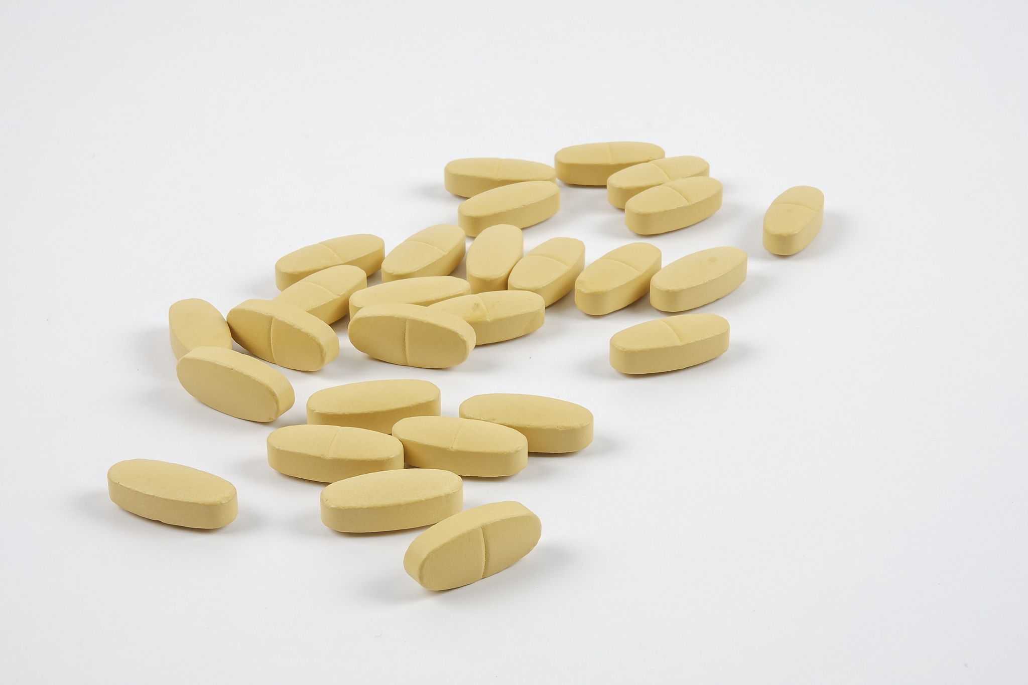 close-up of medicines over white background