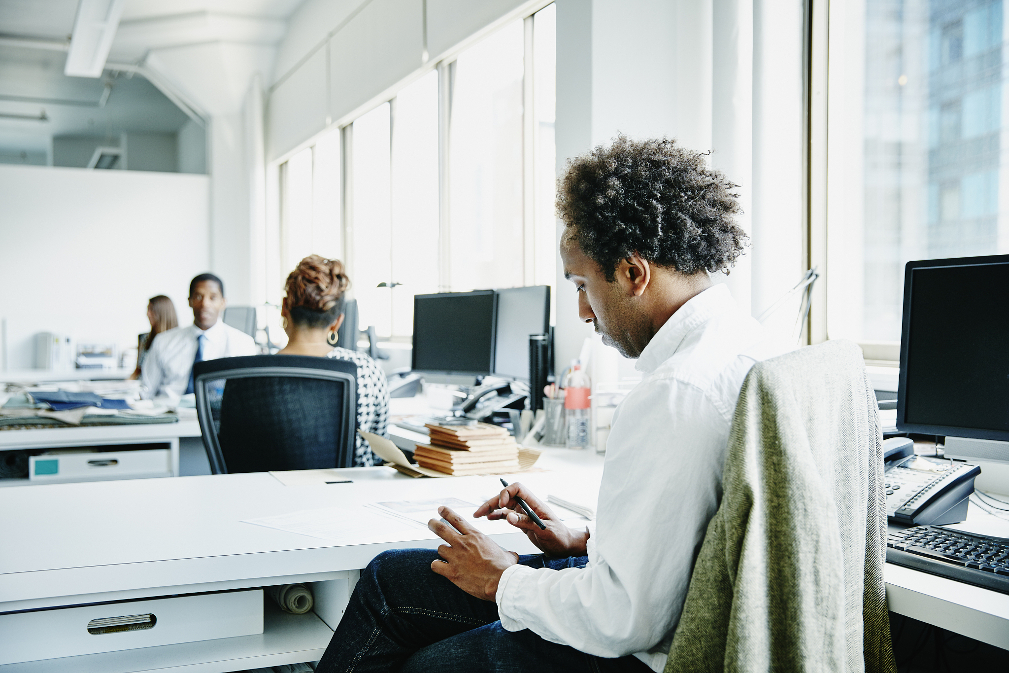 businessman working on smartphone in office