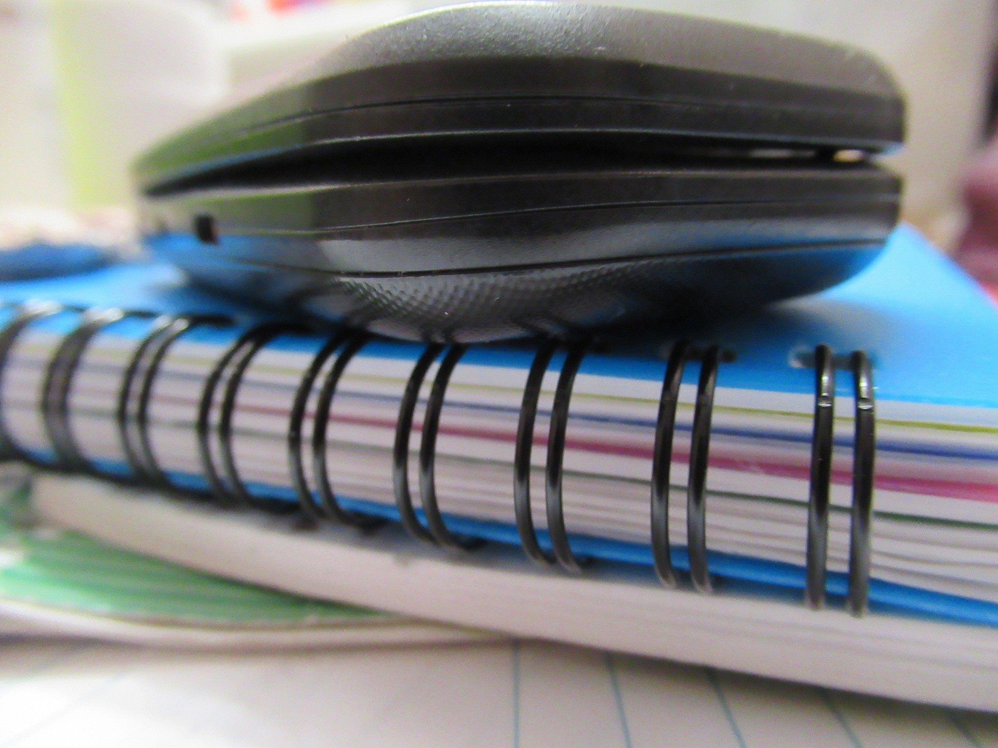 cellphone on spiral notebook 2019