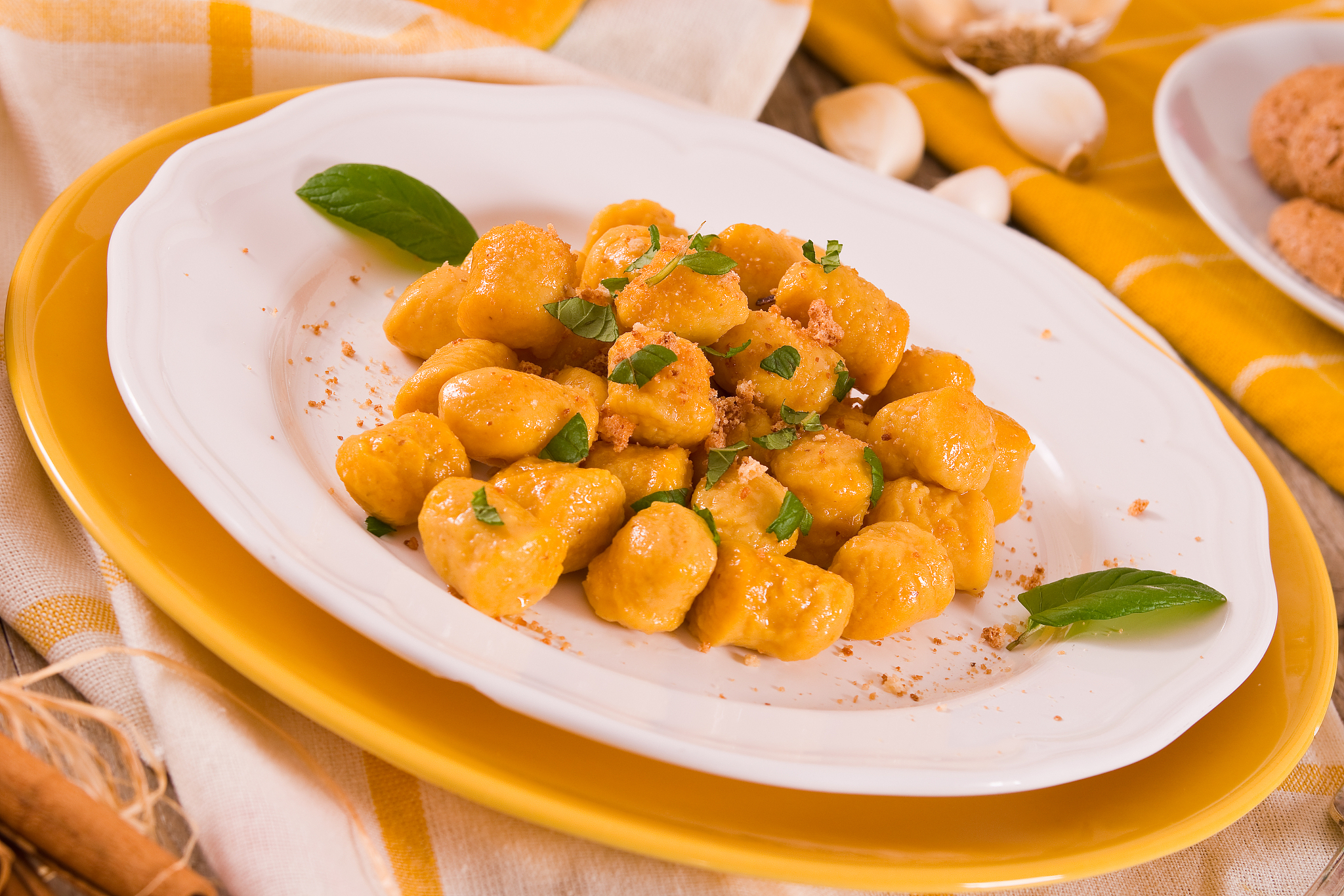 pumpkin gnocchi with grated amaretti cookies.