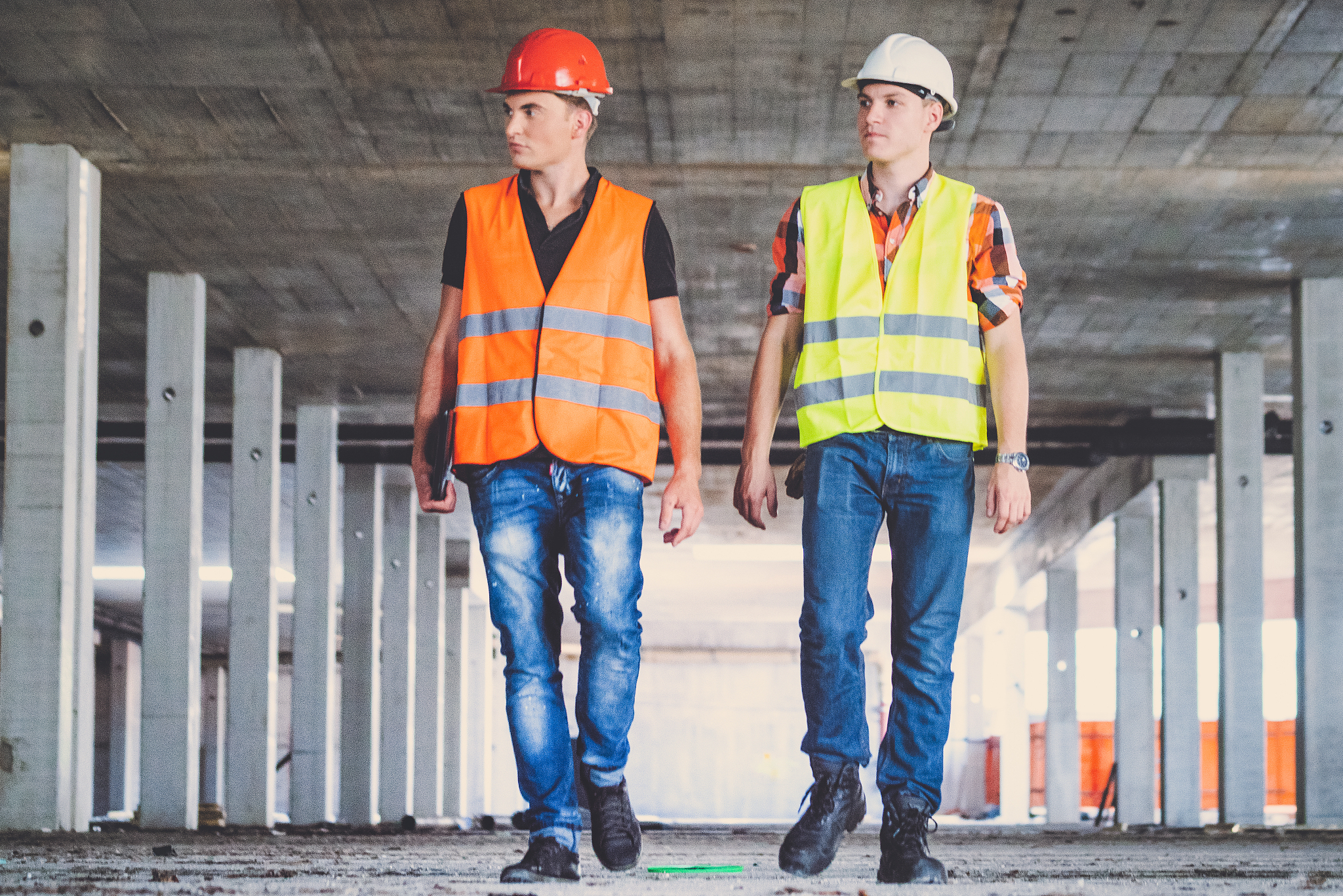 reviewing progress on construction site