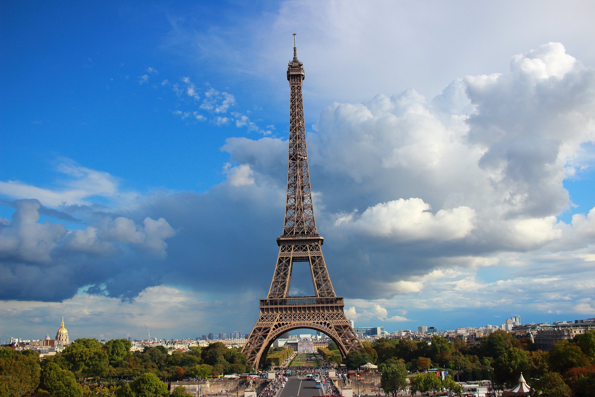 For over 130 years the Eiffel Tower locally named ______________ has been a powerful and distinctive symbol of the city of Paris