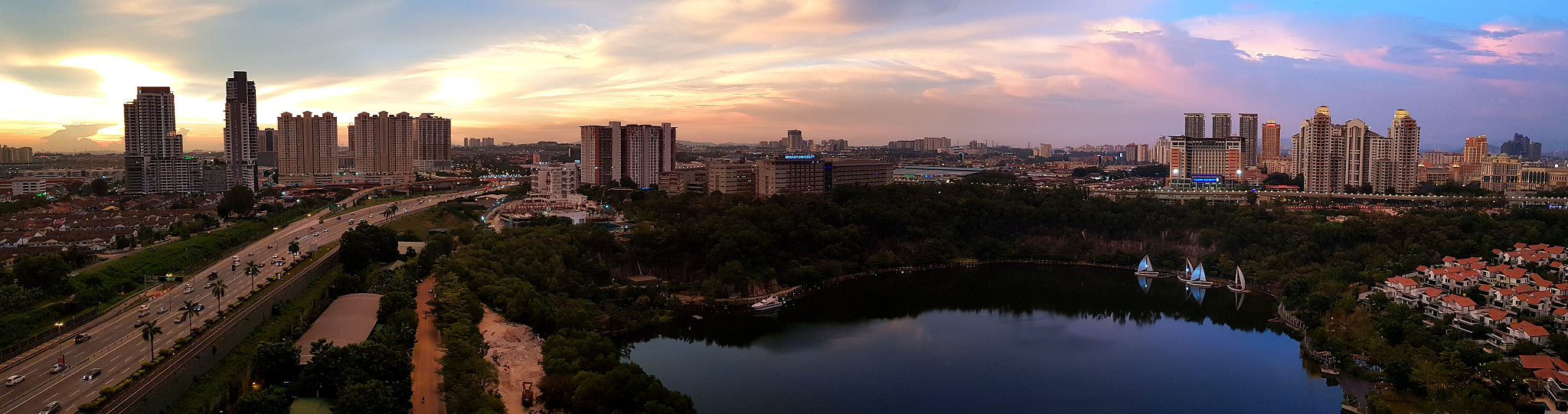 panoramic view of city against sky during sunset