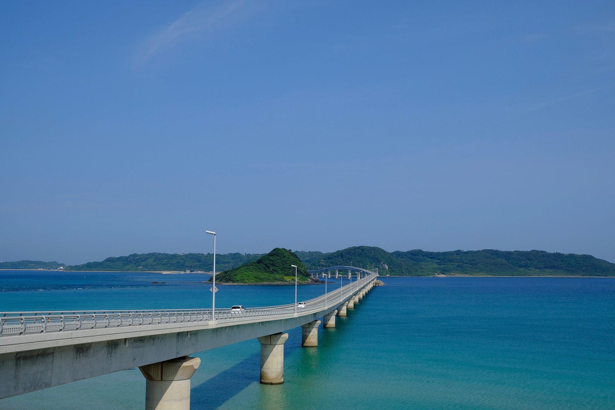 it is a very long and beautiful bridge, and it is a road that ca