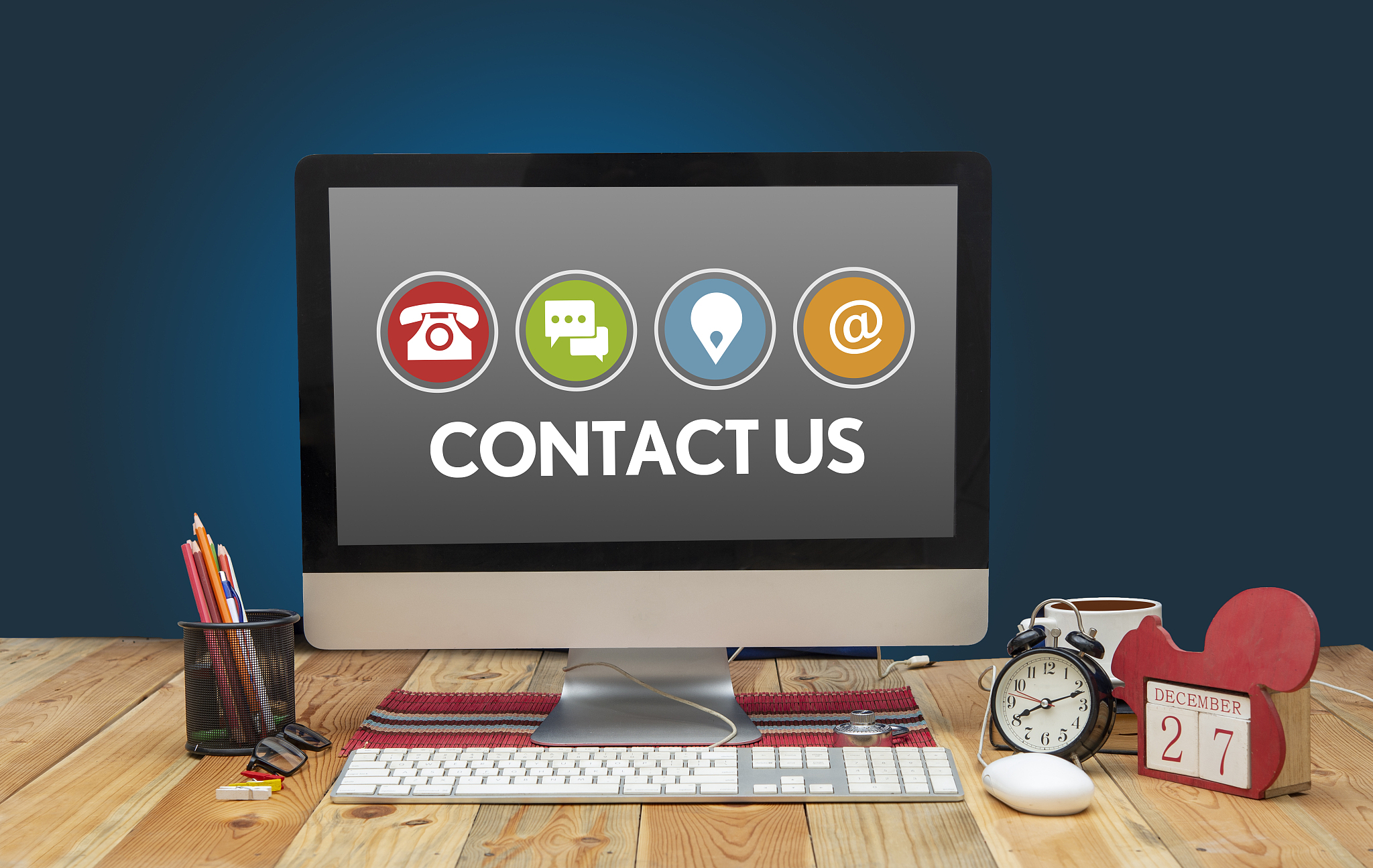 contact us icons on computer screen in office - customer care co