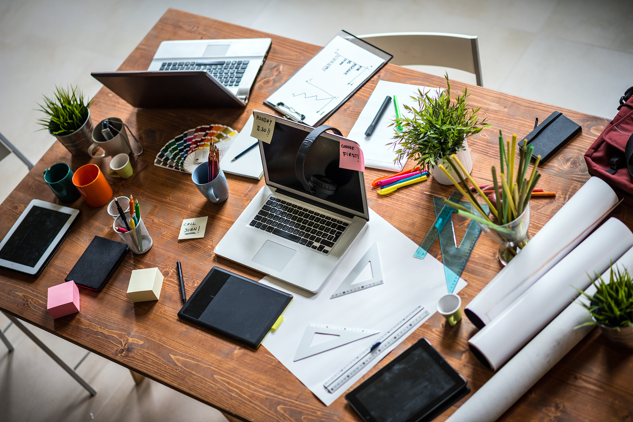 messy desk of young startup coworking business