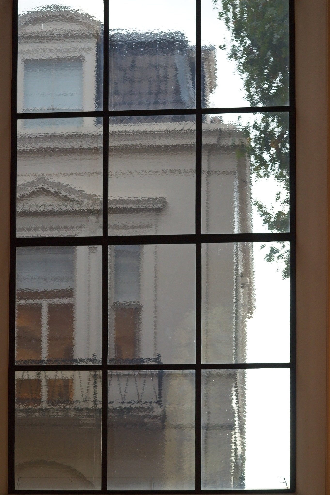 view of townhouse seen through the window.