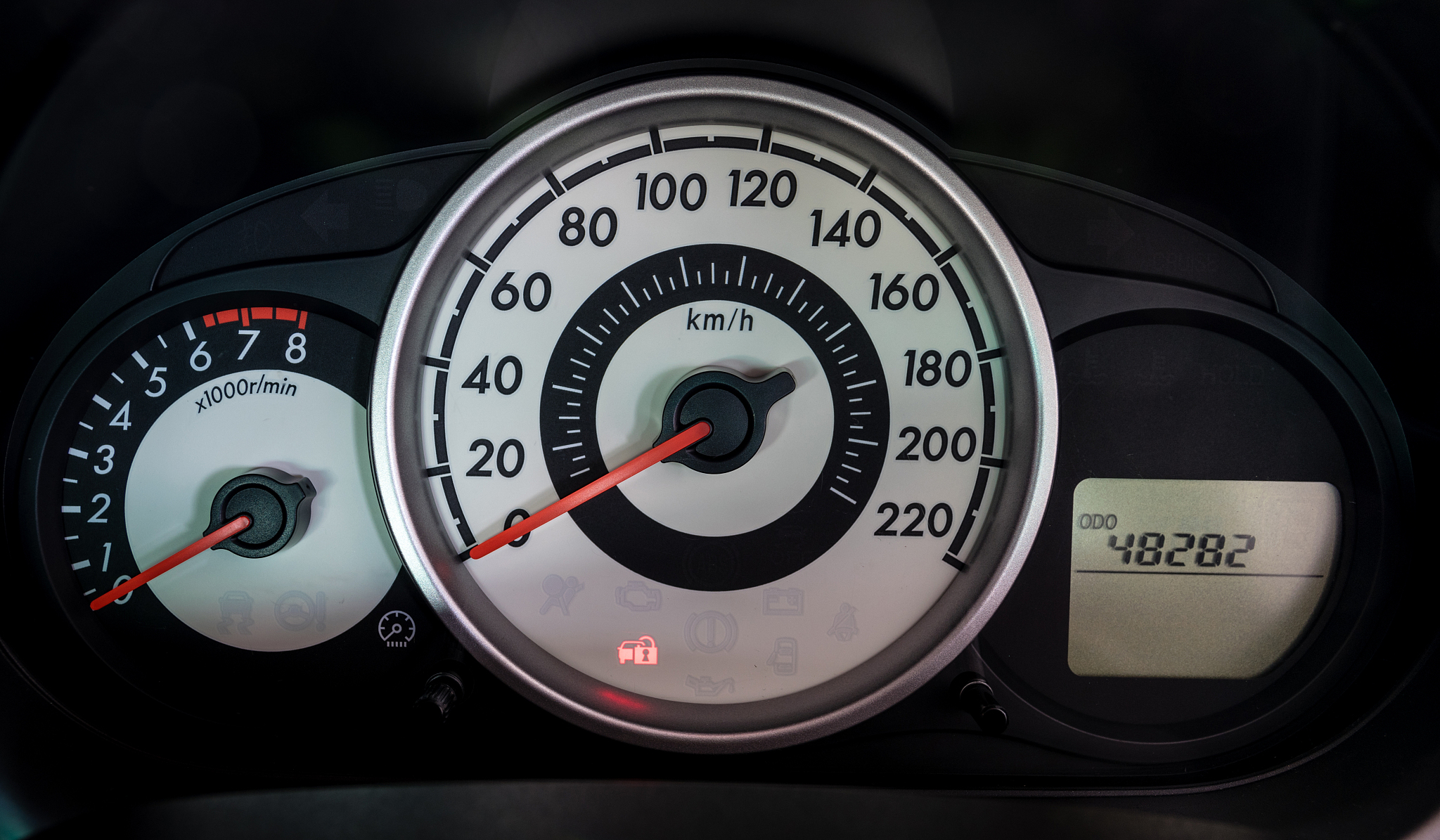 modern car illuminated dashboard closeup