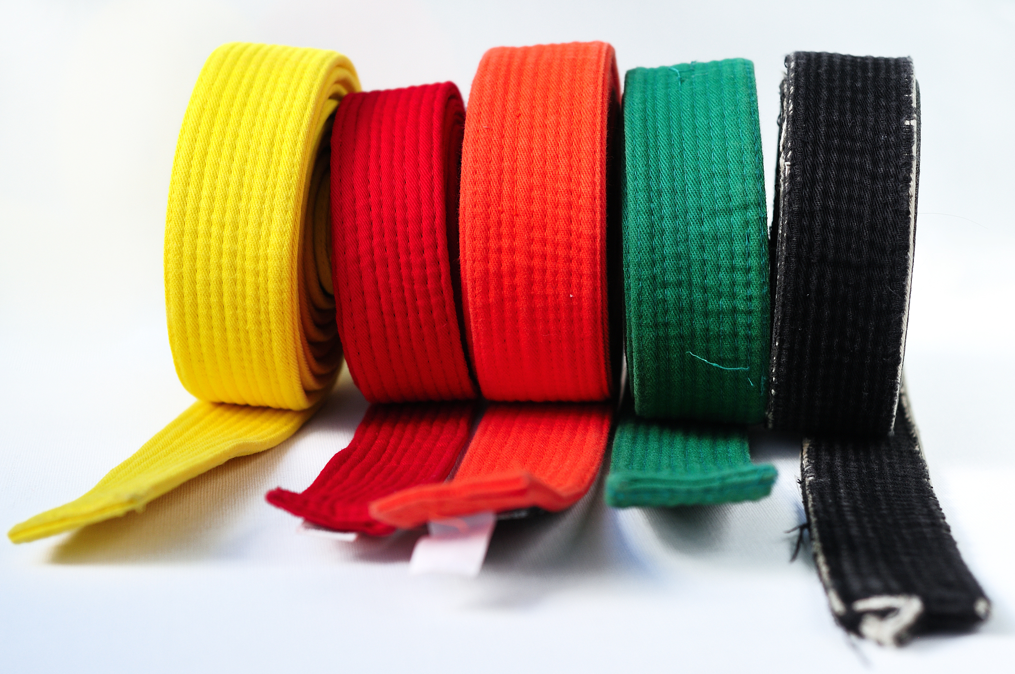 colored belts on a white background