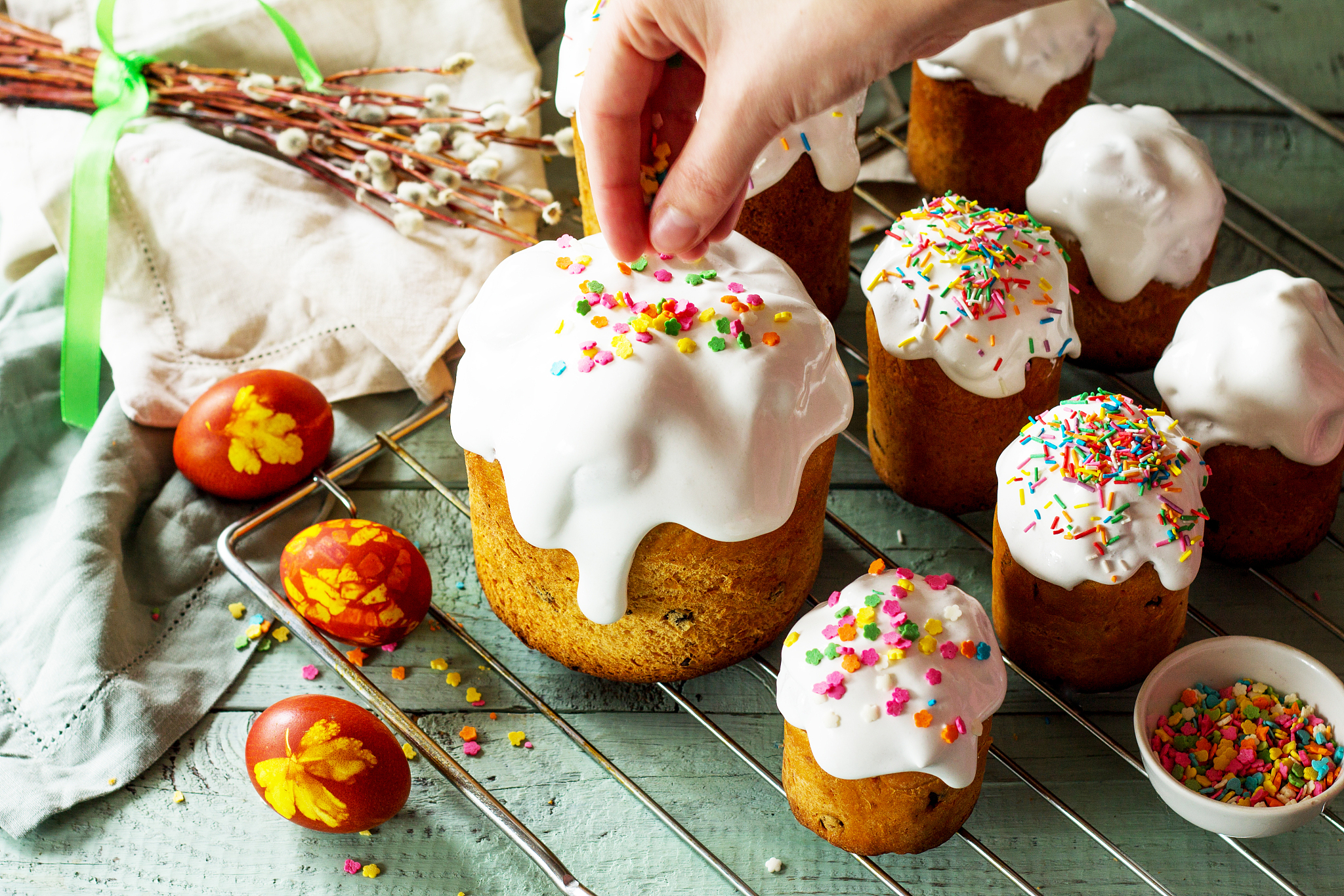 cooking baking. easter cake and painted eggs on white wooden tab