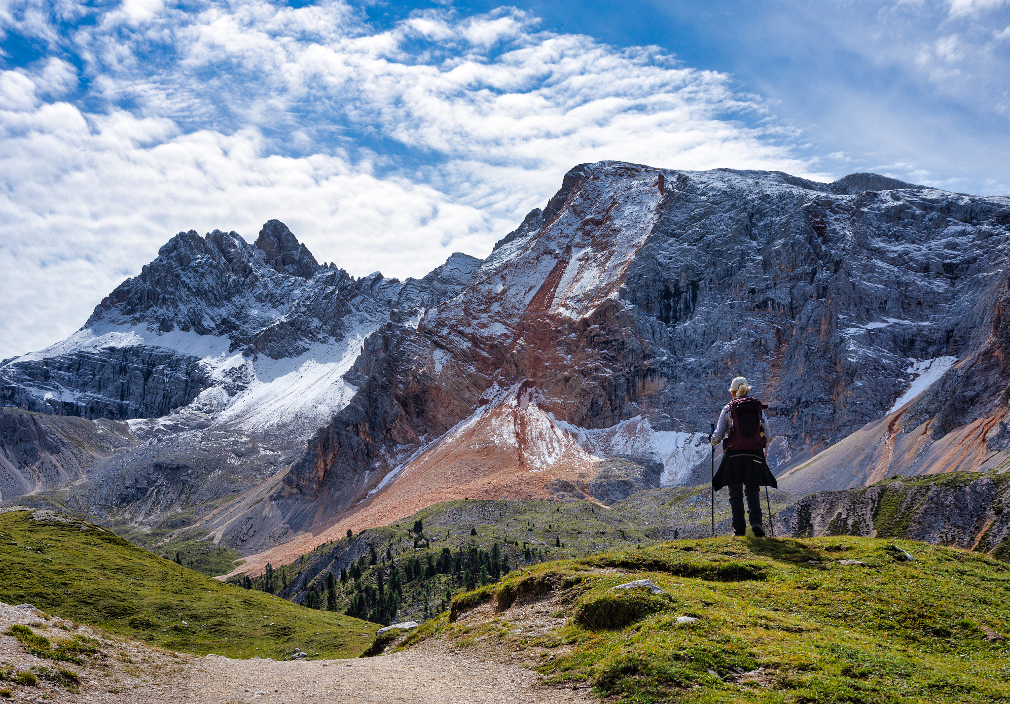 woman hiking in dolomites, fanes-sennes-braies nature park, sout