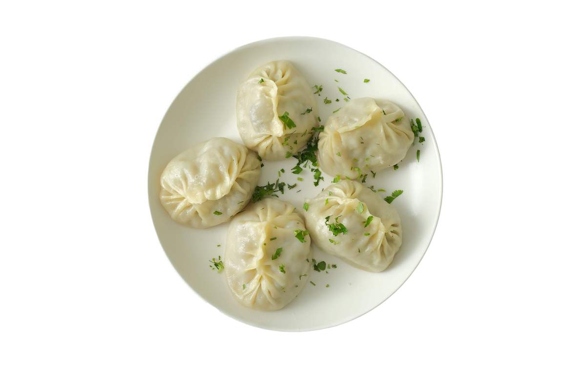 写一篇蒸包子：中国早餐必备