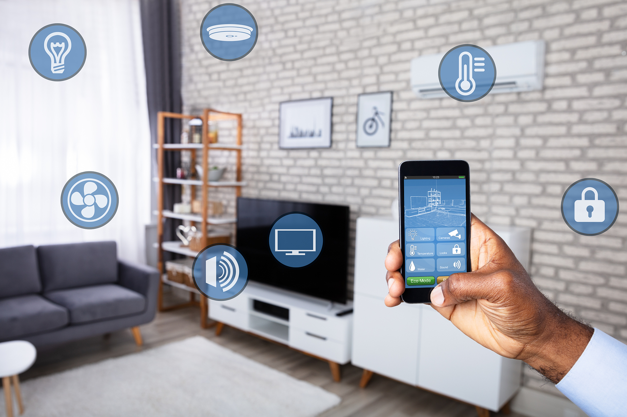 man using home control system on cellphone