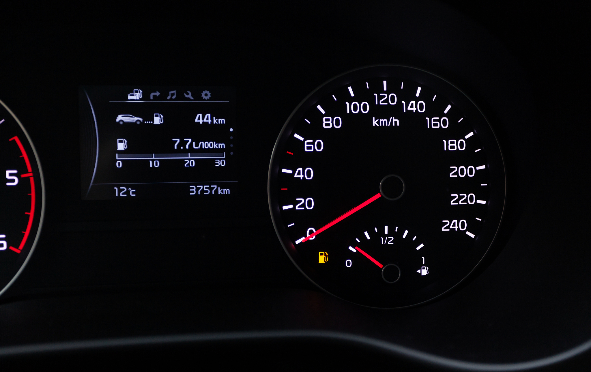 close-up of speedometer in car