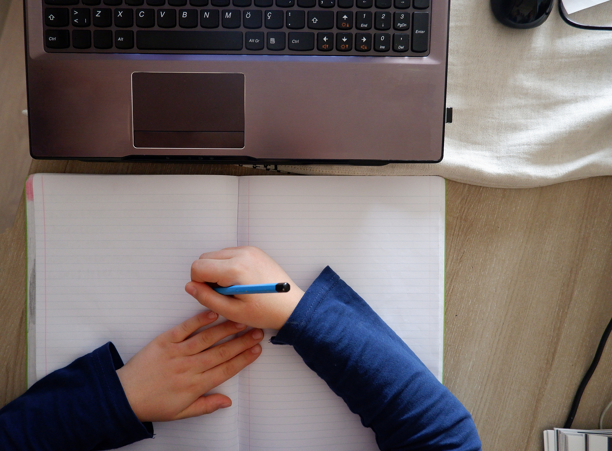 a nine-year-old caucasian turkish boy, studying at home with onl