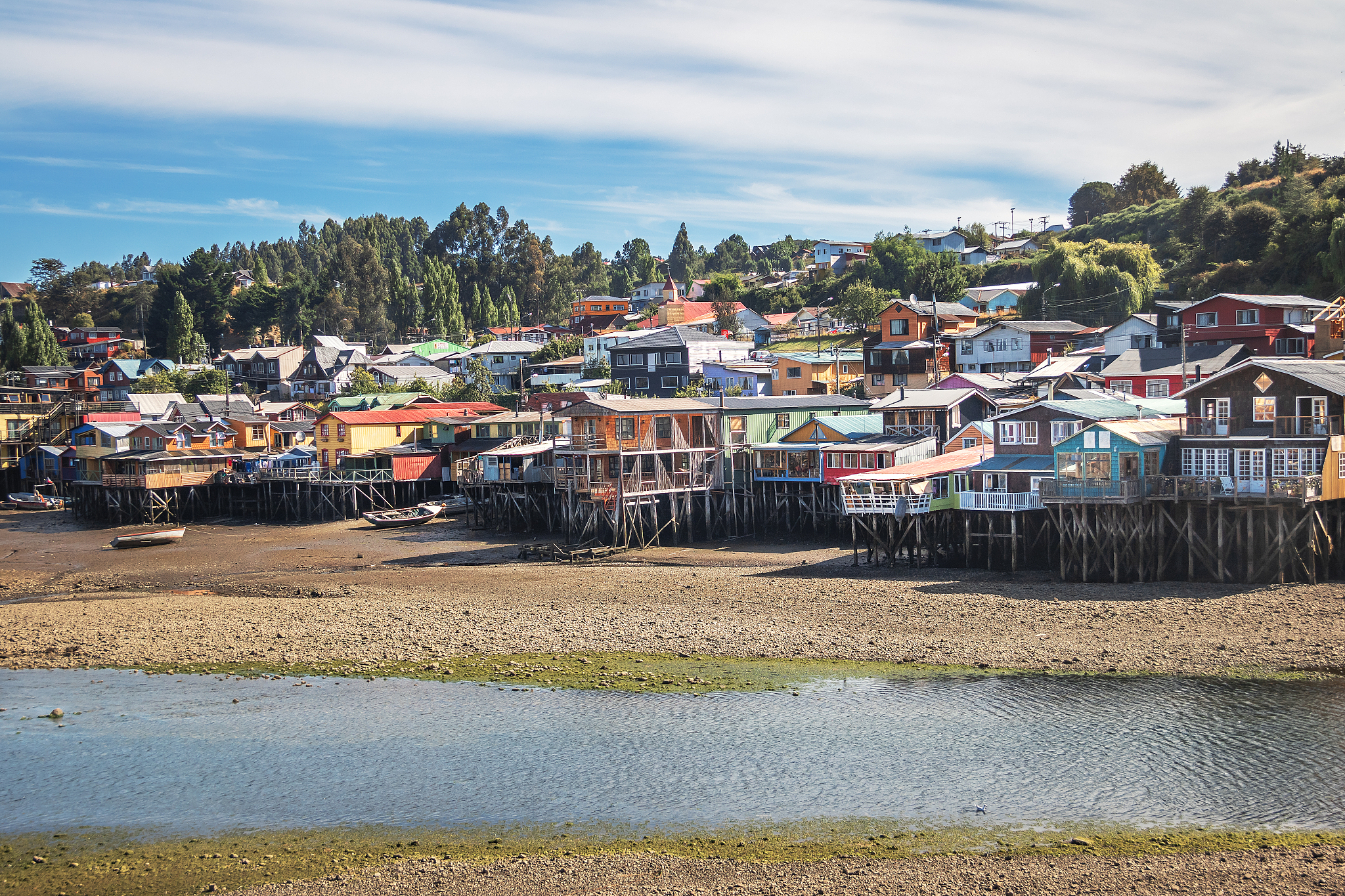 gamboa palafitos stilt houses at low tide - castro, chiloe islan