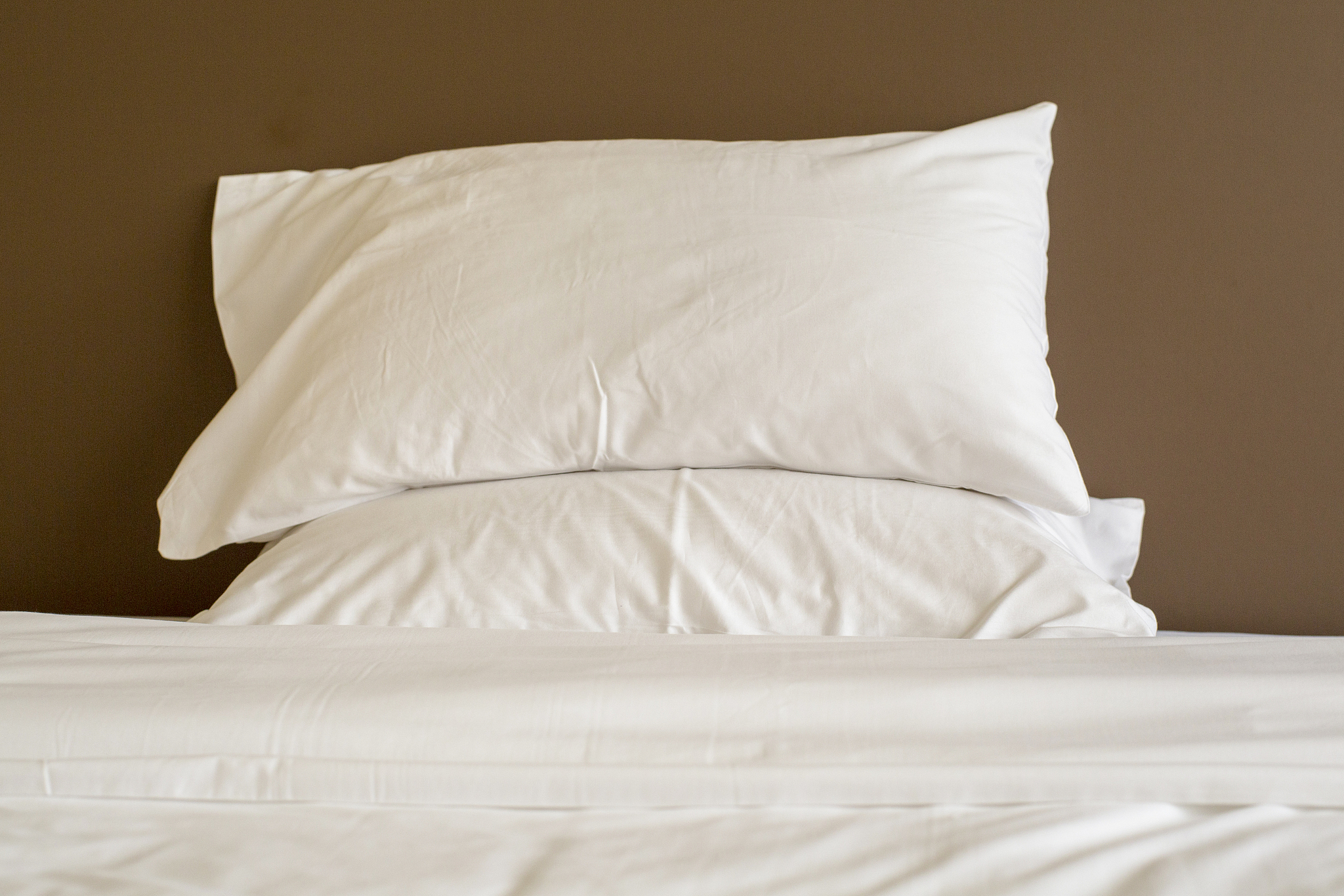 quilt and pillow in bedroom