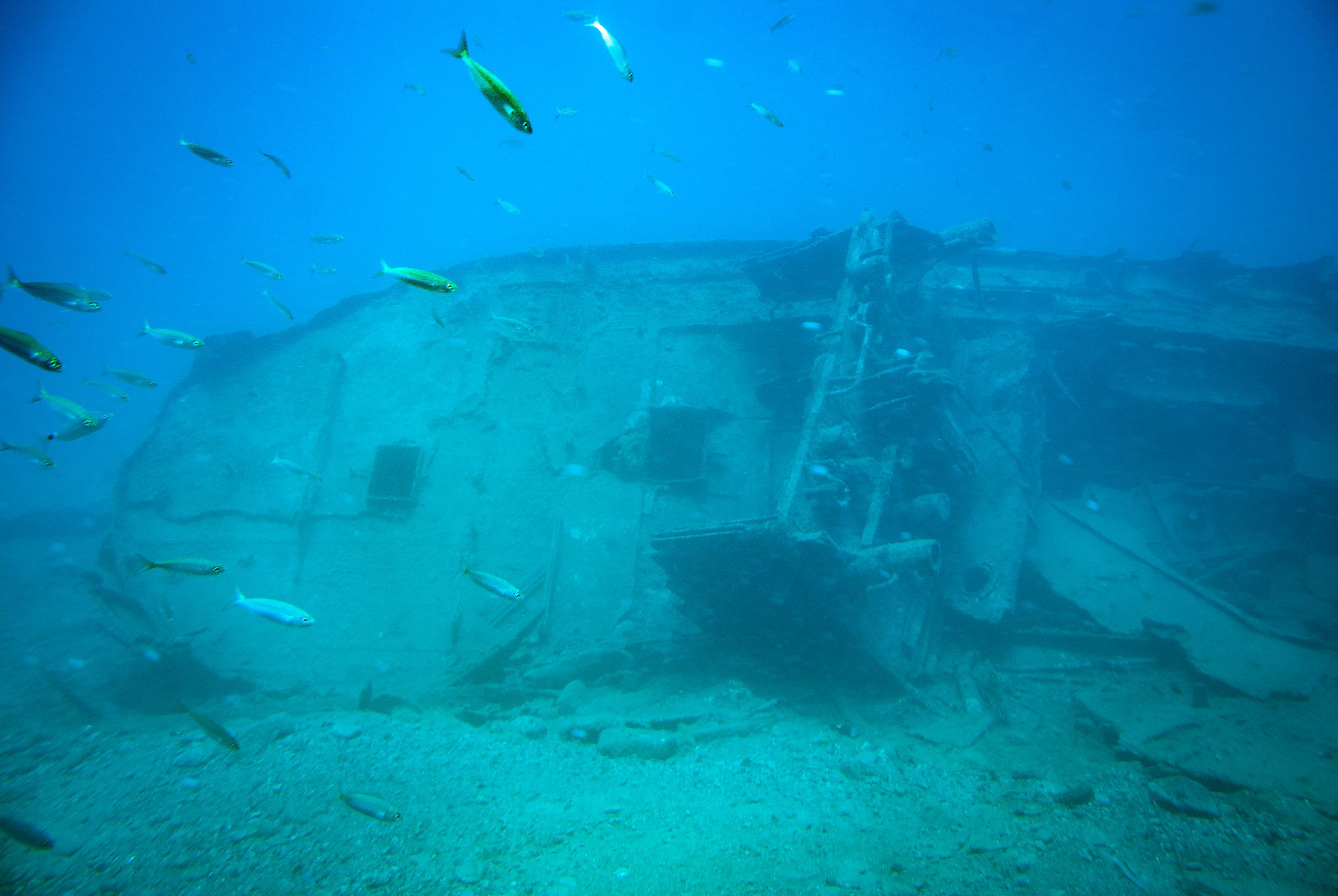 details of a ship wreck in the blue water